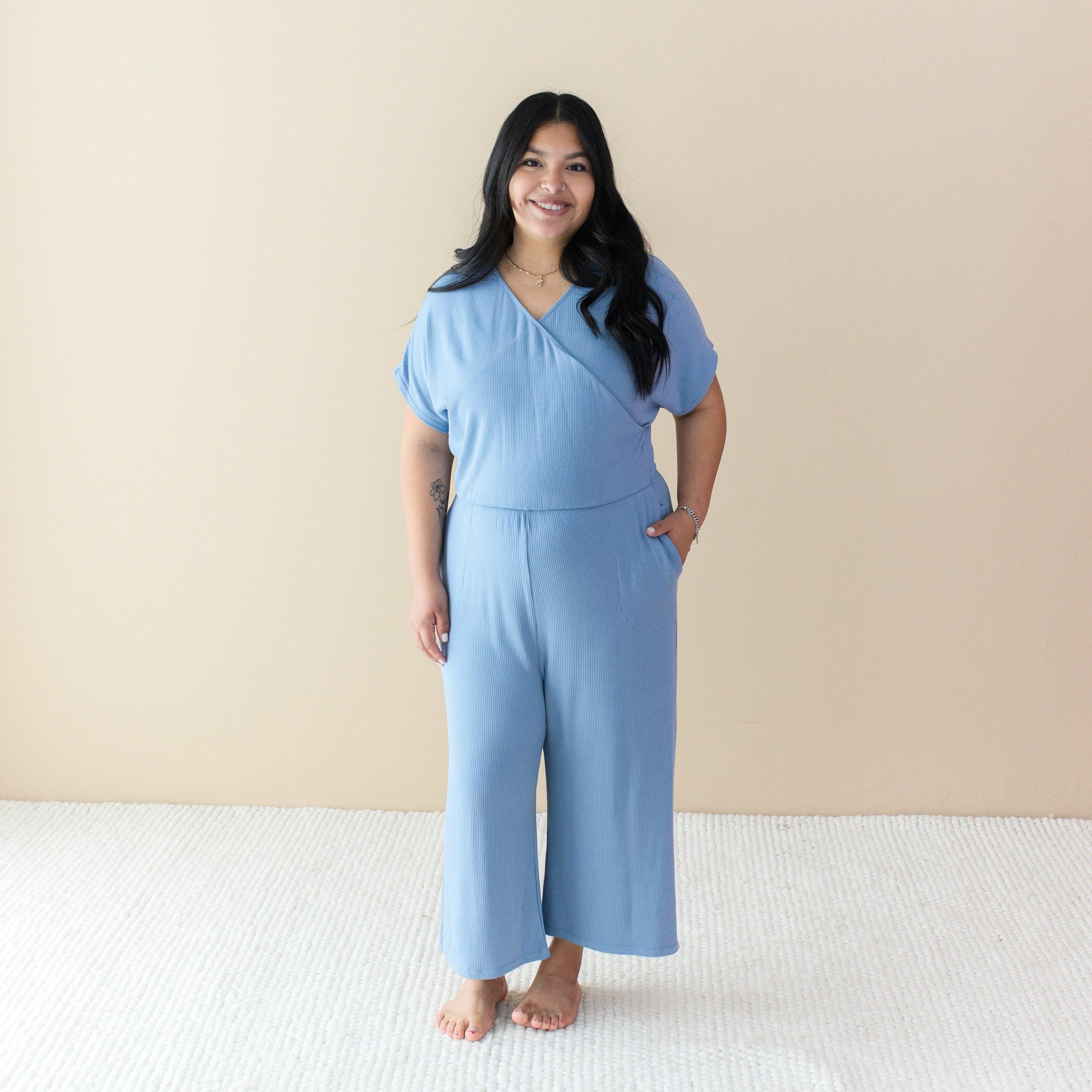 Woman wearing Blue Ribbed Jumpsuit with Pockets