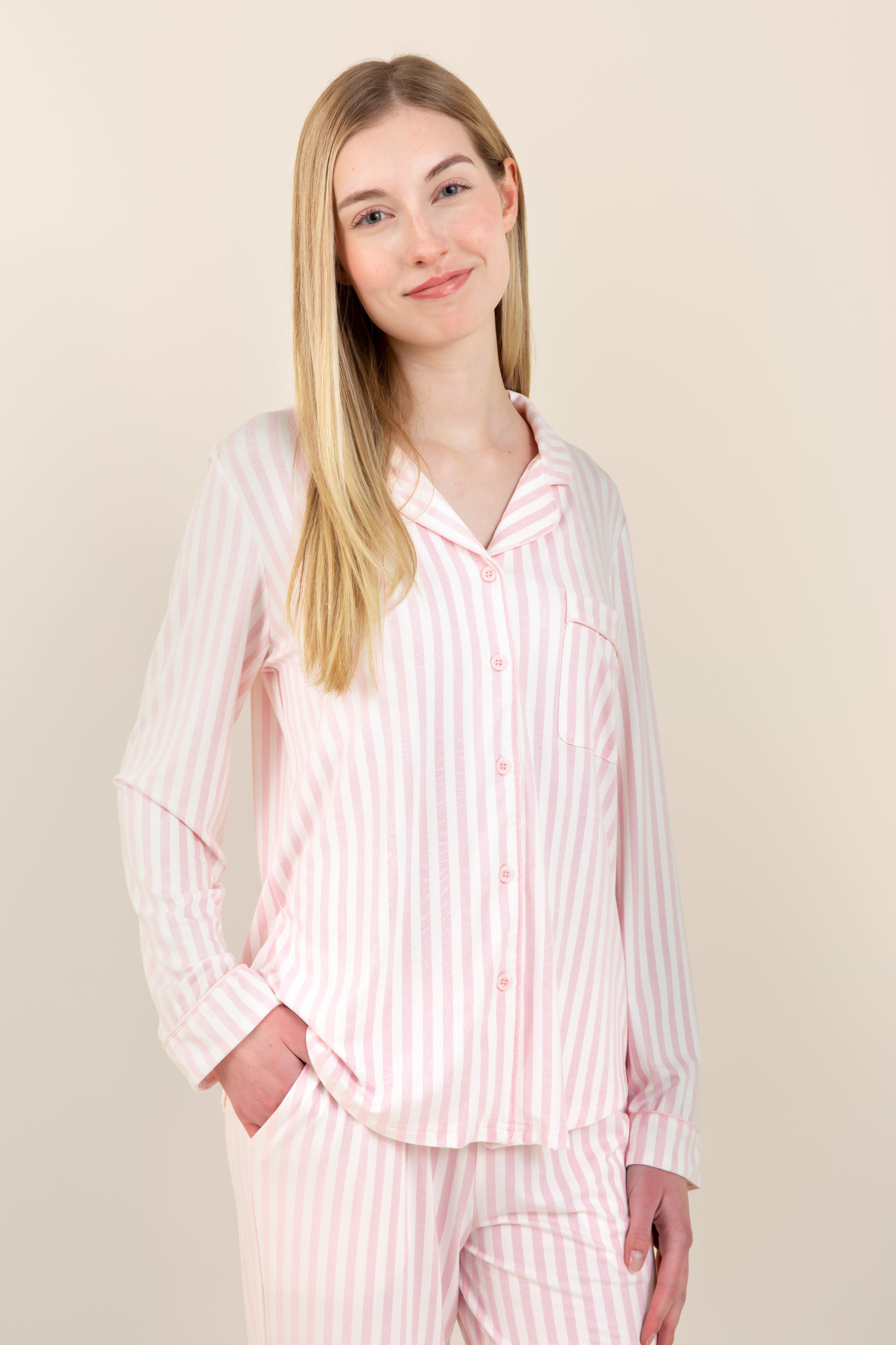 Close up of a female wearing the Long-Sleeved Women's Pajama Set in Small Sakura Stripe