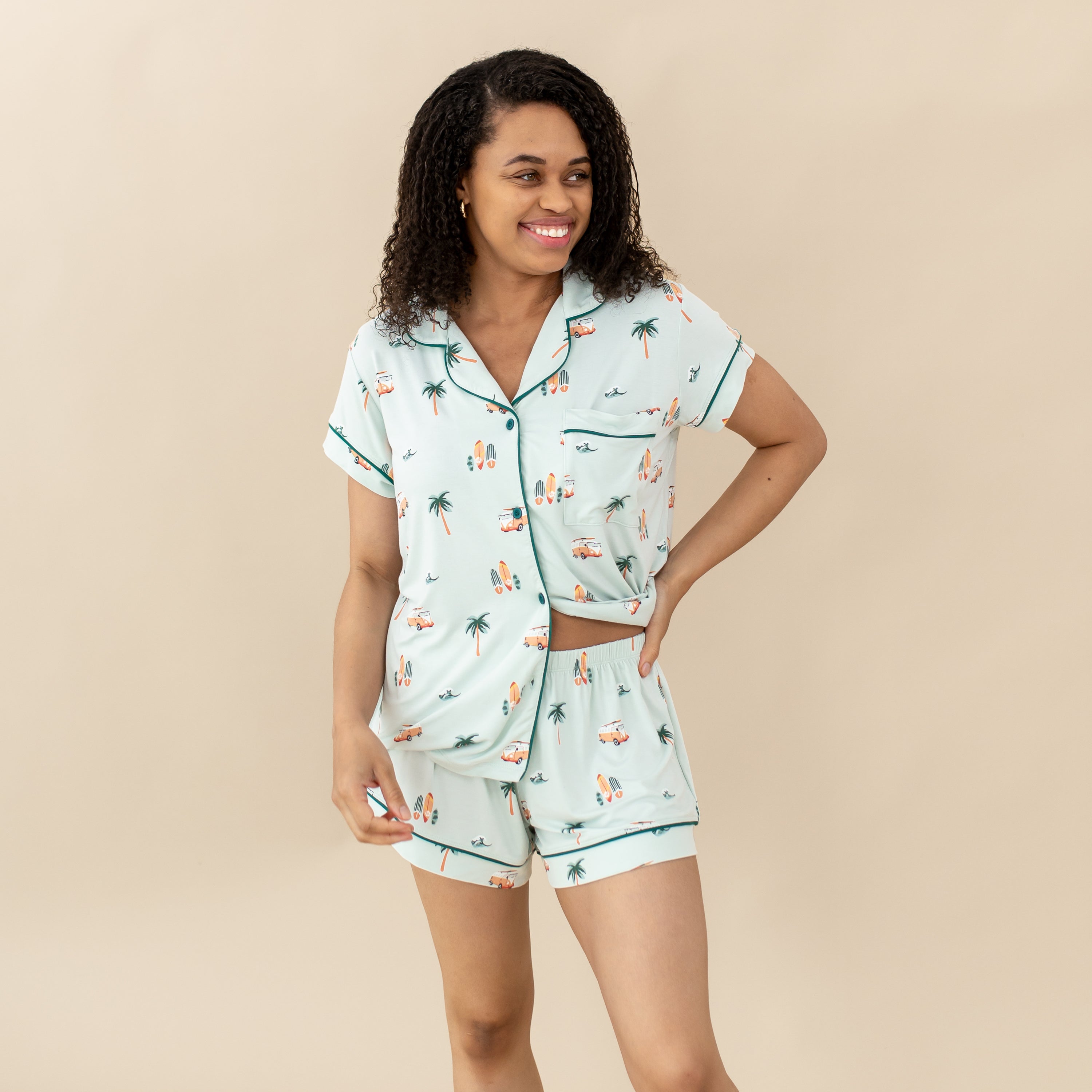Woman modeling Women's Short Sleeve Pajama Set in Dew Surf showing waist band of shorts