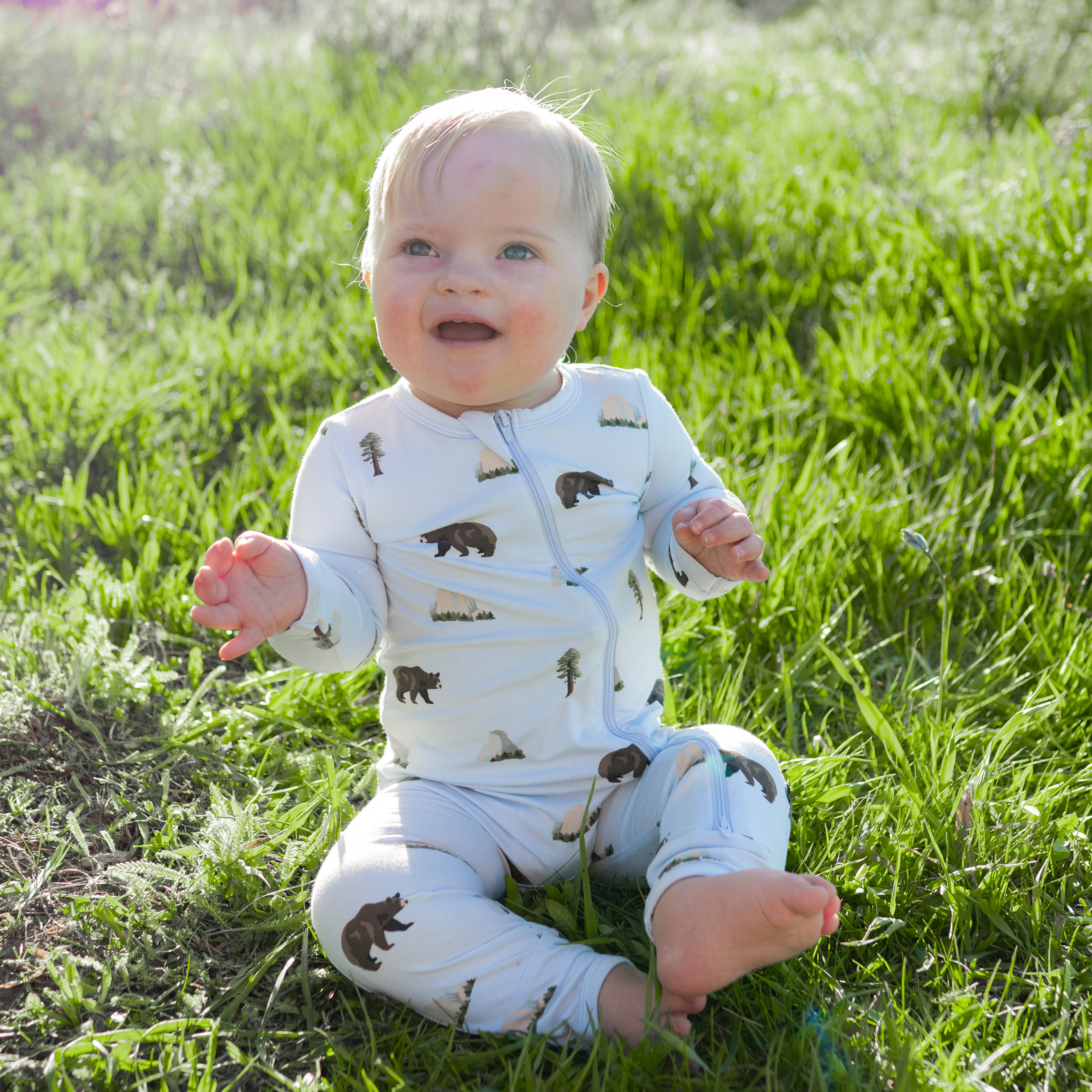 Sitting baby in Zippered Romper in Yosemite
