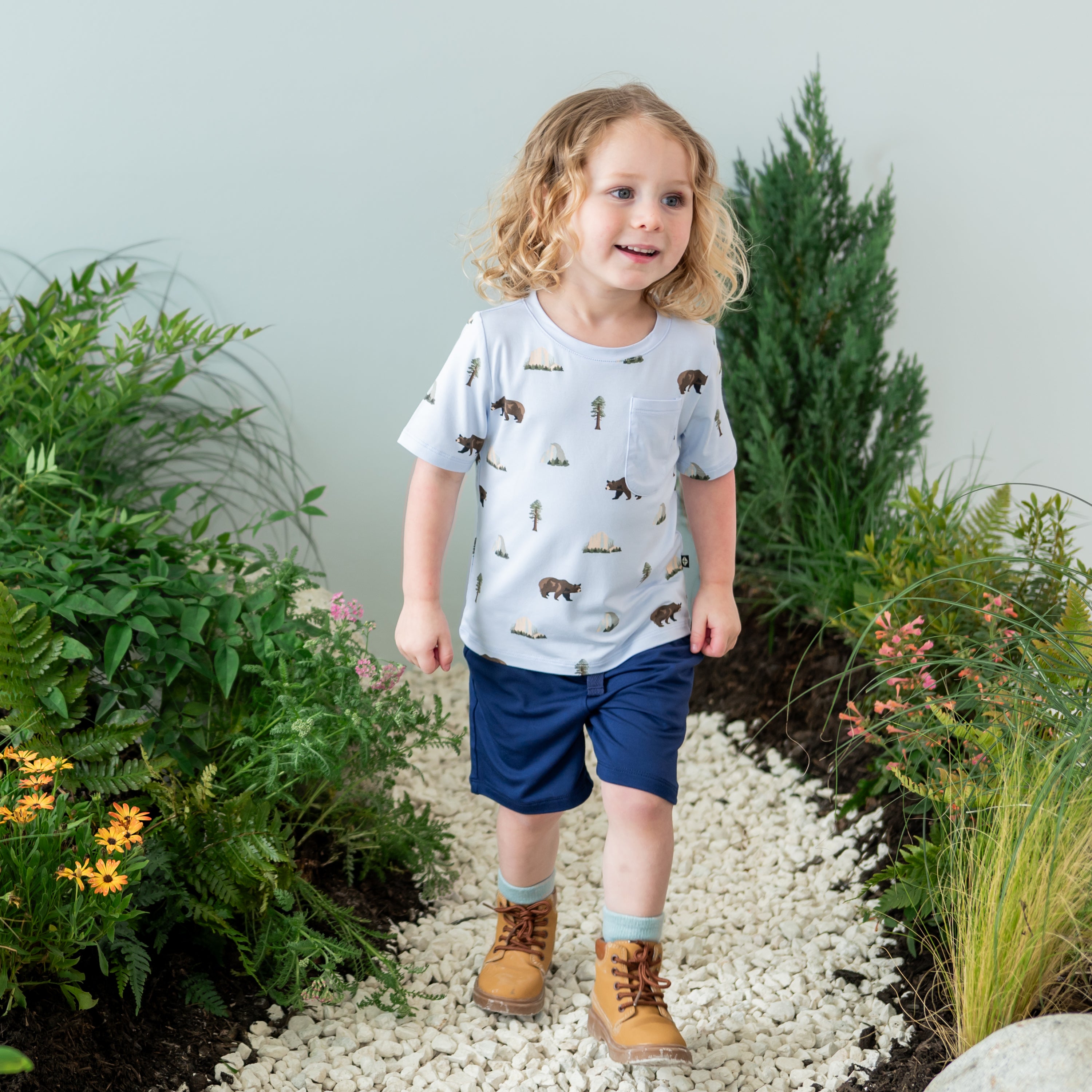Toddler modeling Toddler Crew Neck Tee in Yosemite on a nature trail backdrop