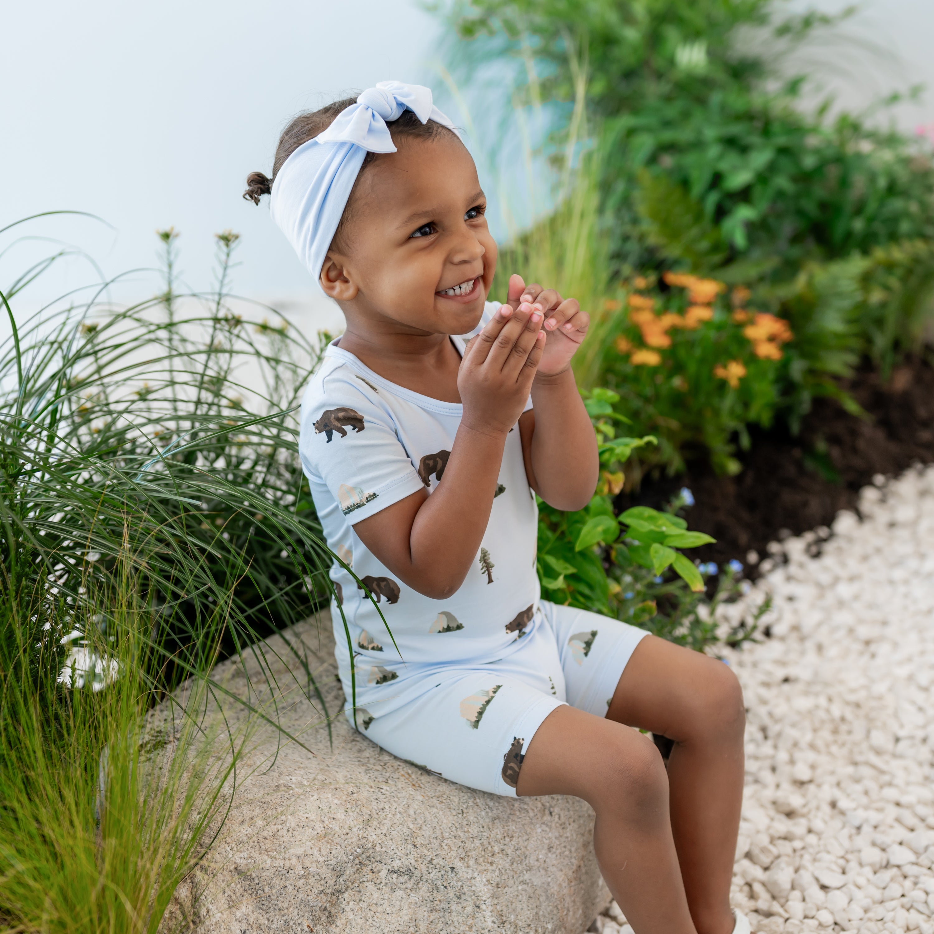 Toddler wearing Short Sleeve Pajamas in Yosemite on a nature trail