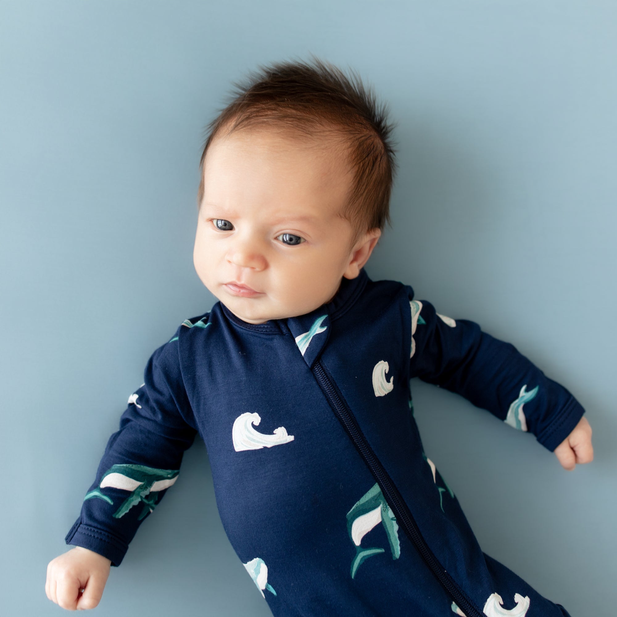Baby wearing Zippered Footie kids pajamas in Humpback