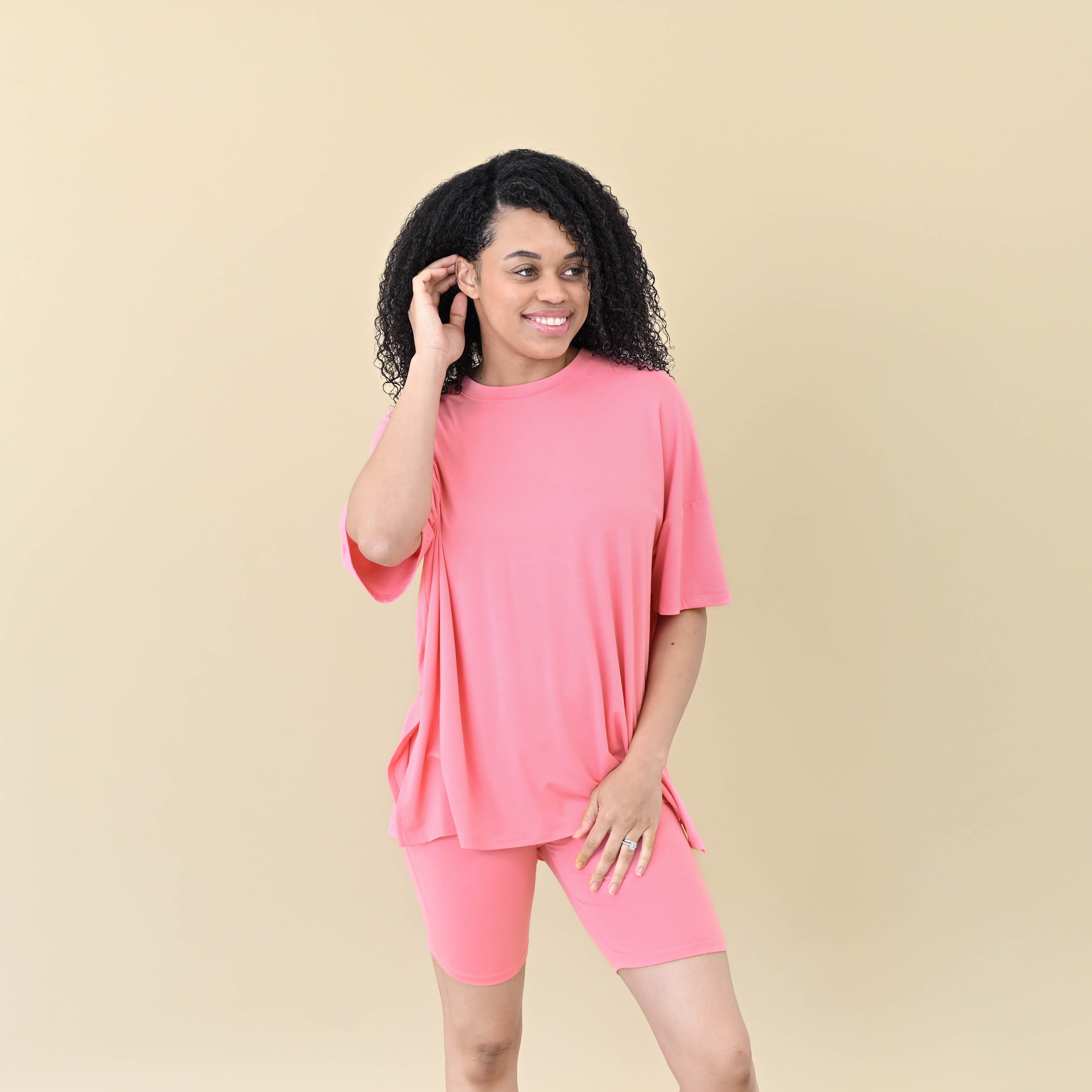 Woman modeling Women’s Biker Short Set in Guava