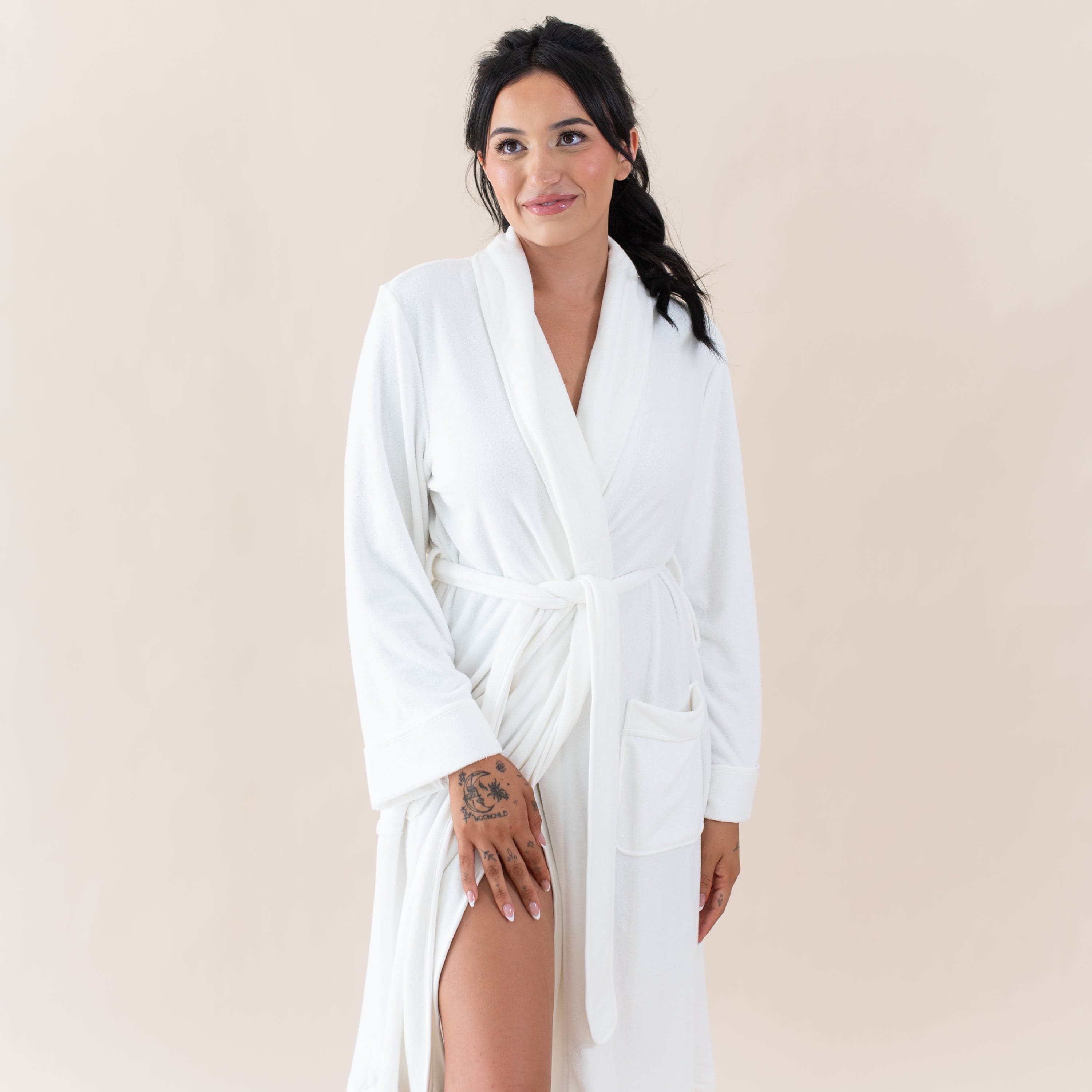 Woman wearing Kyte Baby Adult Robe in Cloud
