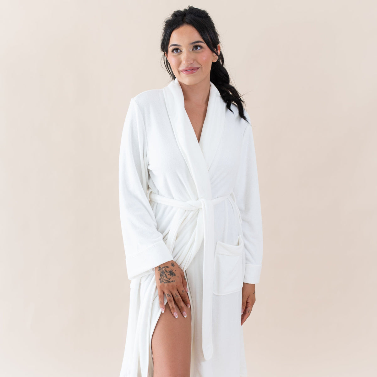 Woman wearing Kyte Baby Adult Robe in Cloud