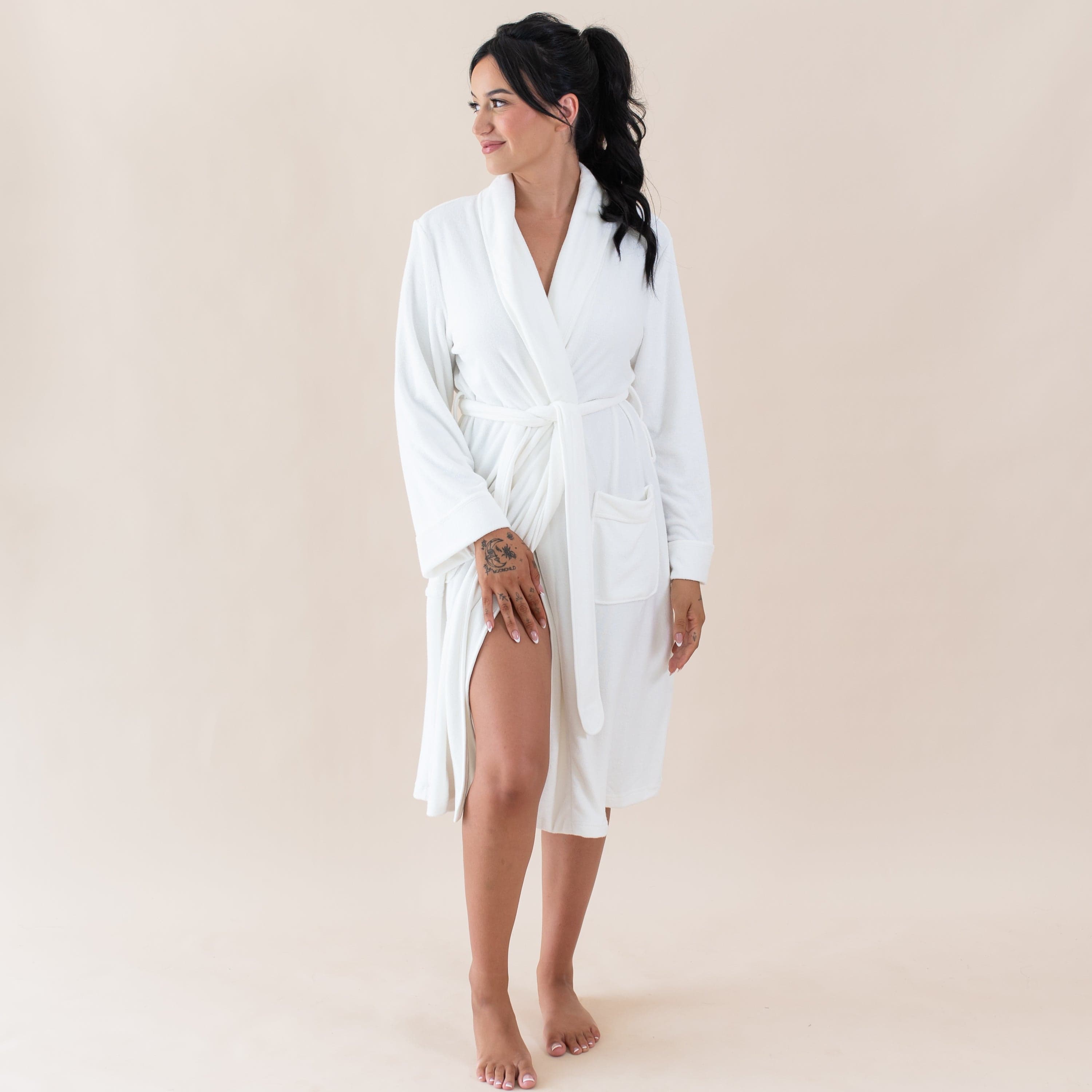 Woman wearing Kyte Baby Bamboo Terry Adult Robe in Cloud