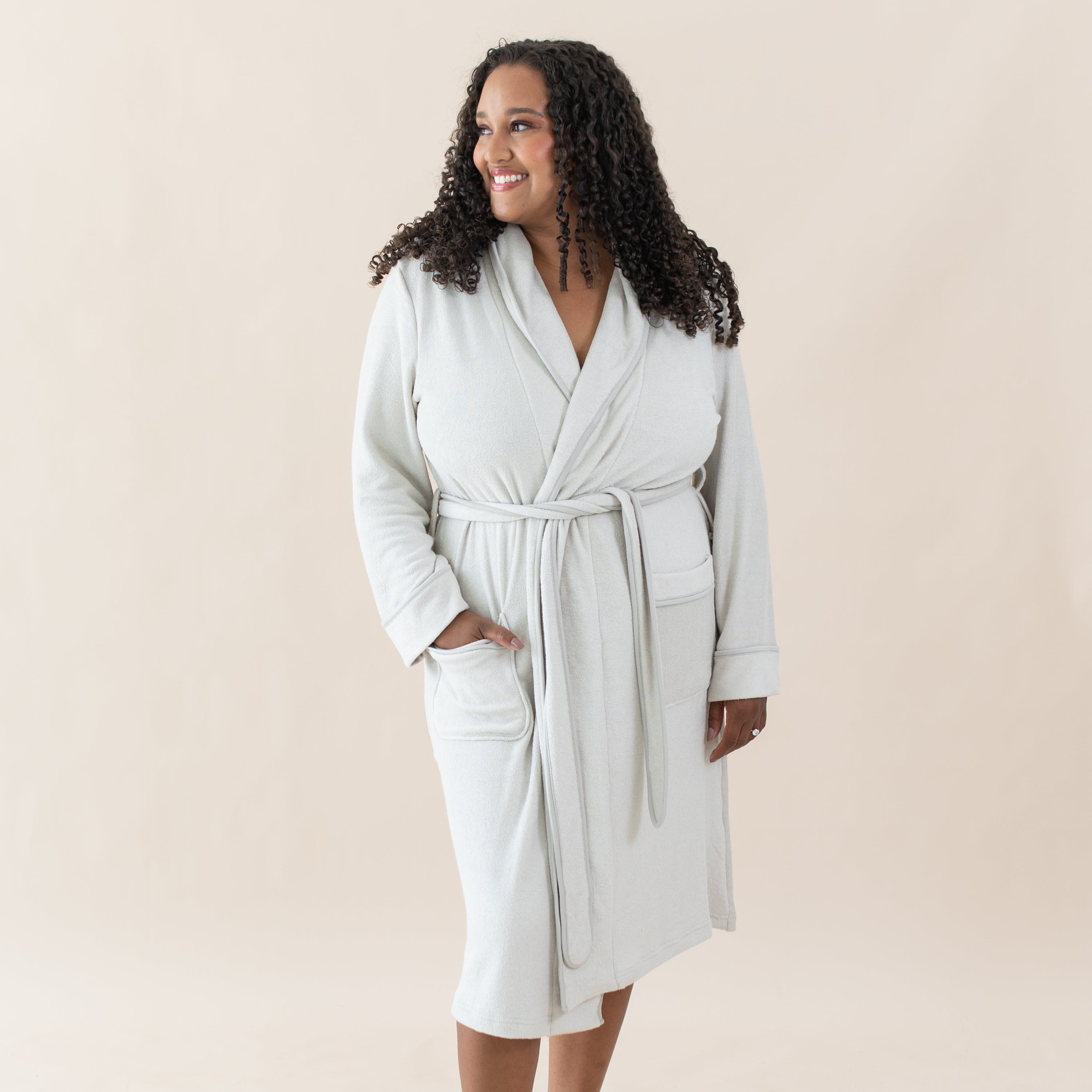 Woman wearing Kyte Baby Adult Robe in Oat