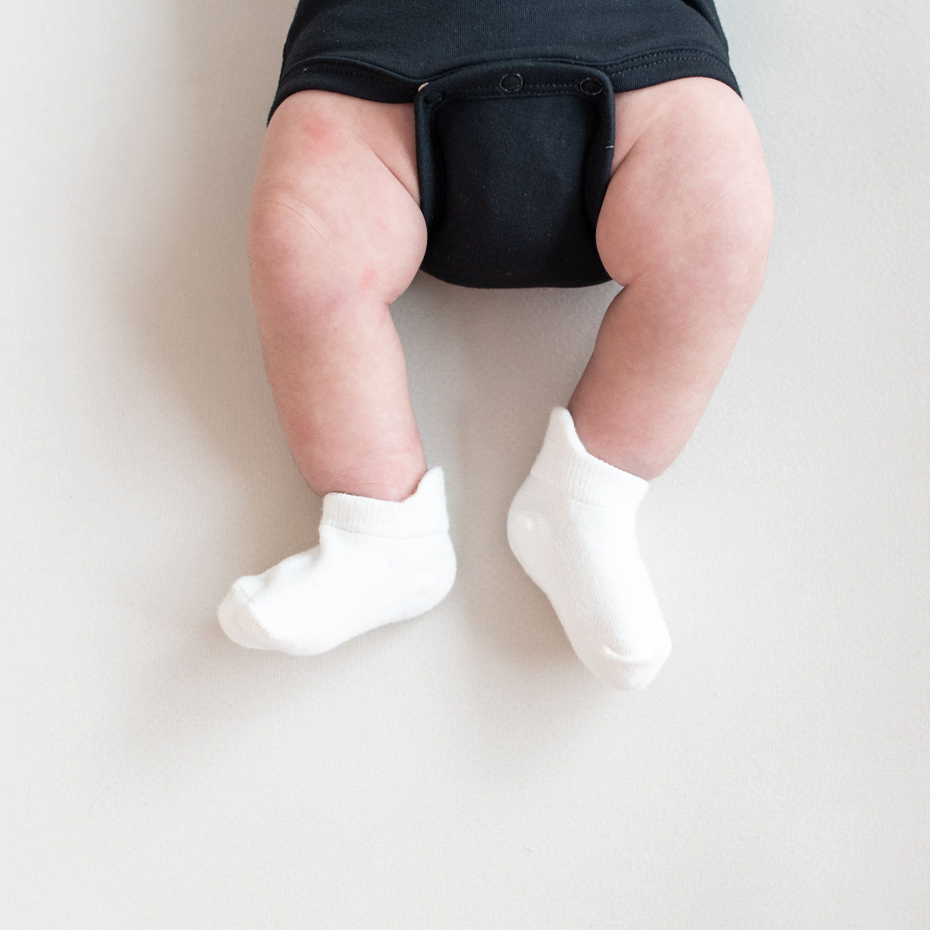 Newborn wearing Ankle Socks in Cloud white