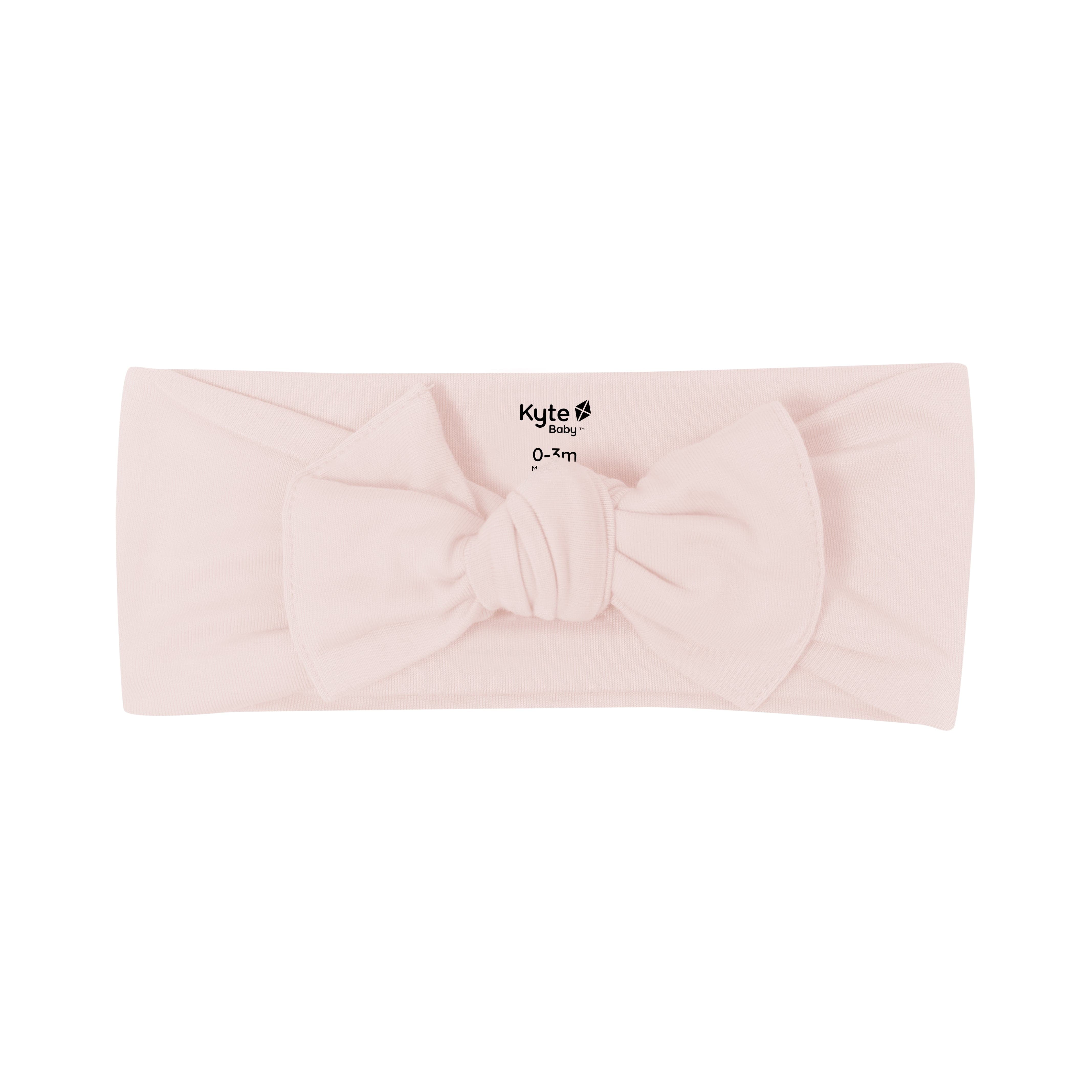 Flat lay of Kyte Baby Bow in Blush
