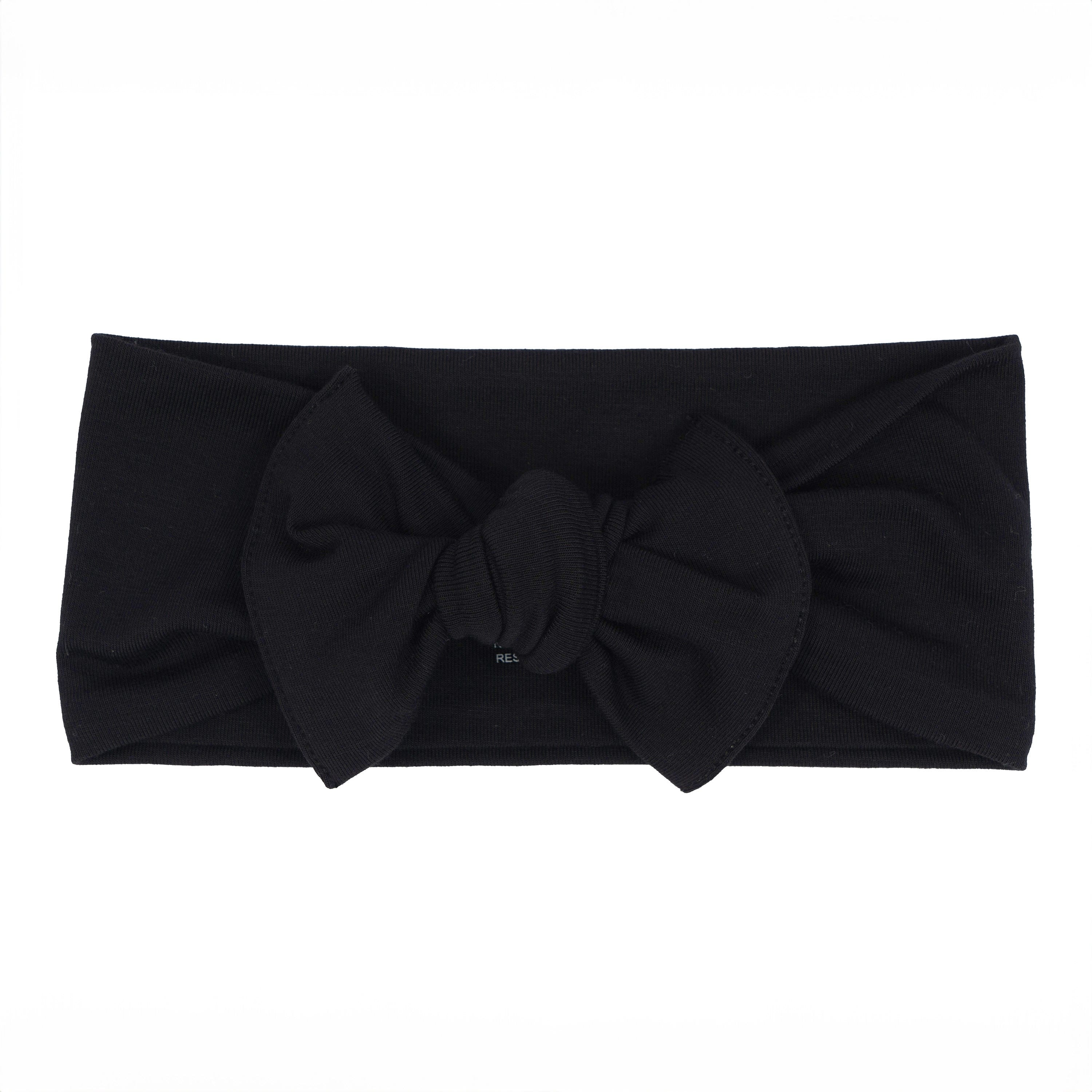 Flat lay of Kyte Baby Bow in Midnight