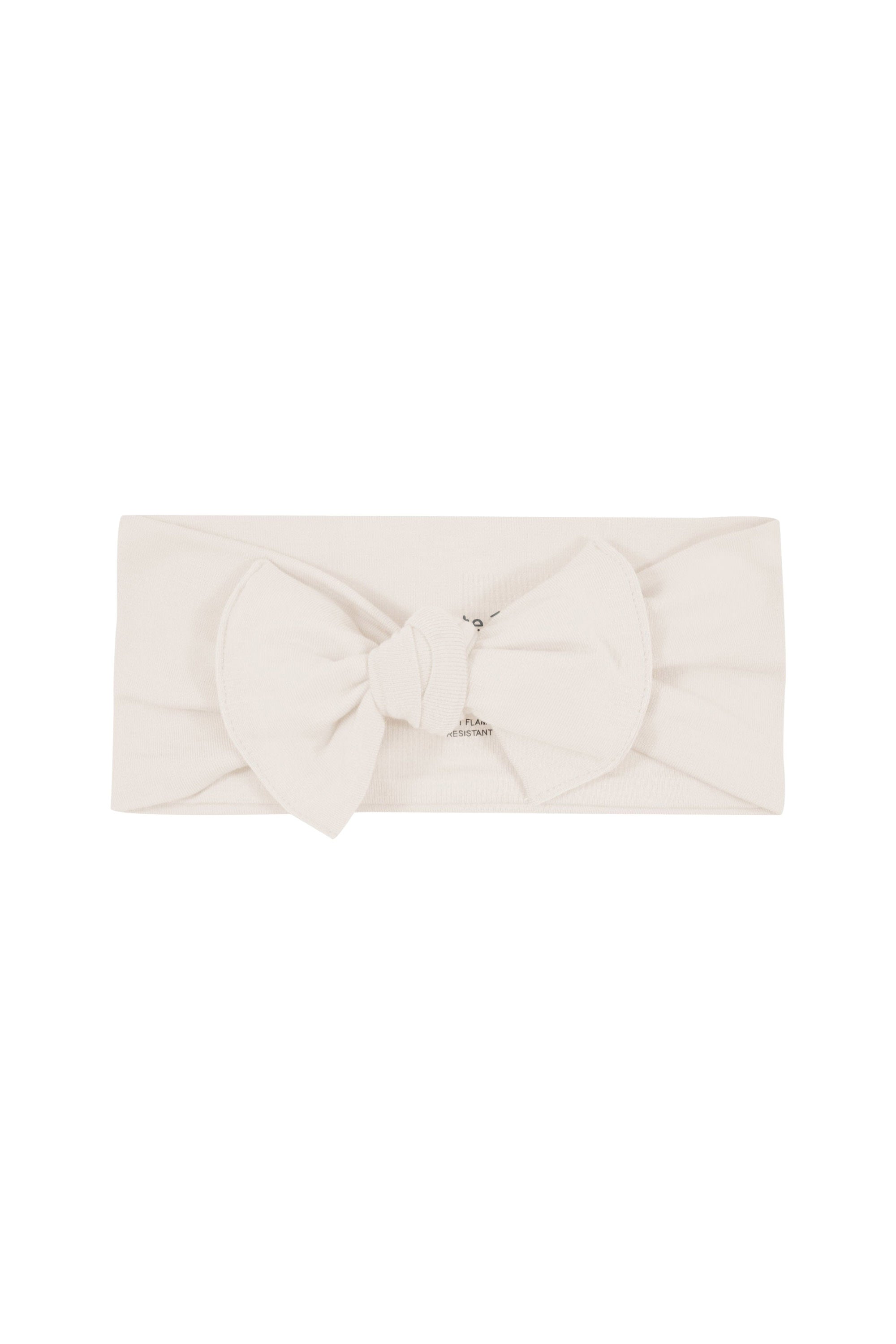 Flat lay of Kyte Baby Bow in Oat