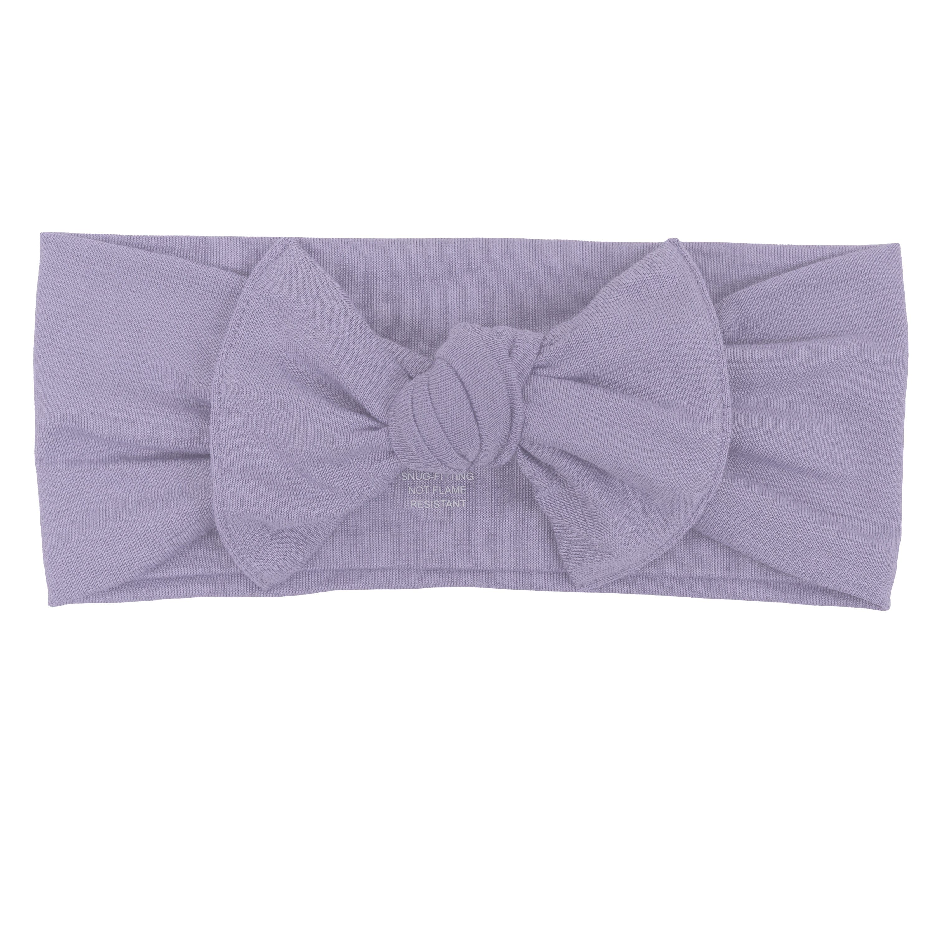 Flat lay of Kyte Baby Bow in Taro