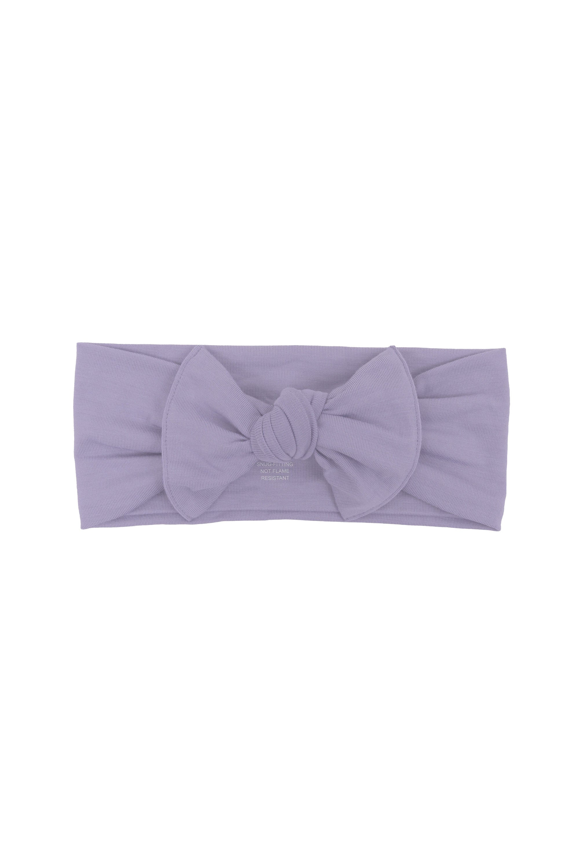 Flat lay of Kyte Baby Bow in Taro