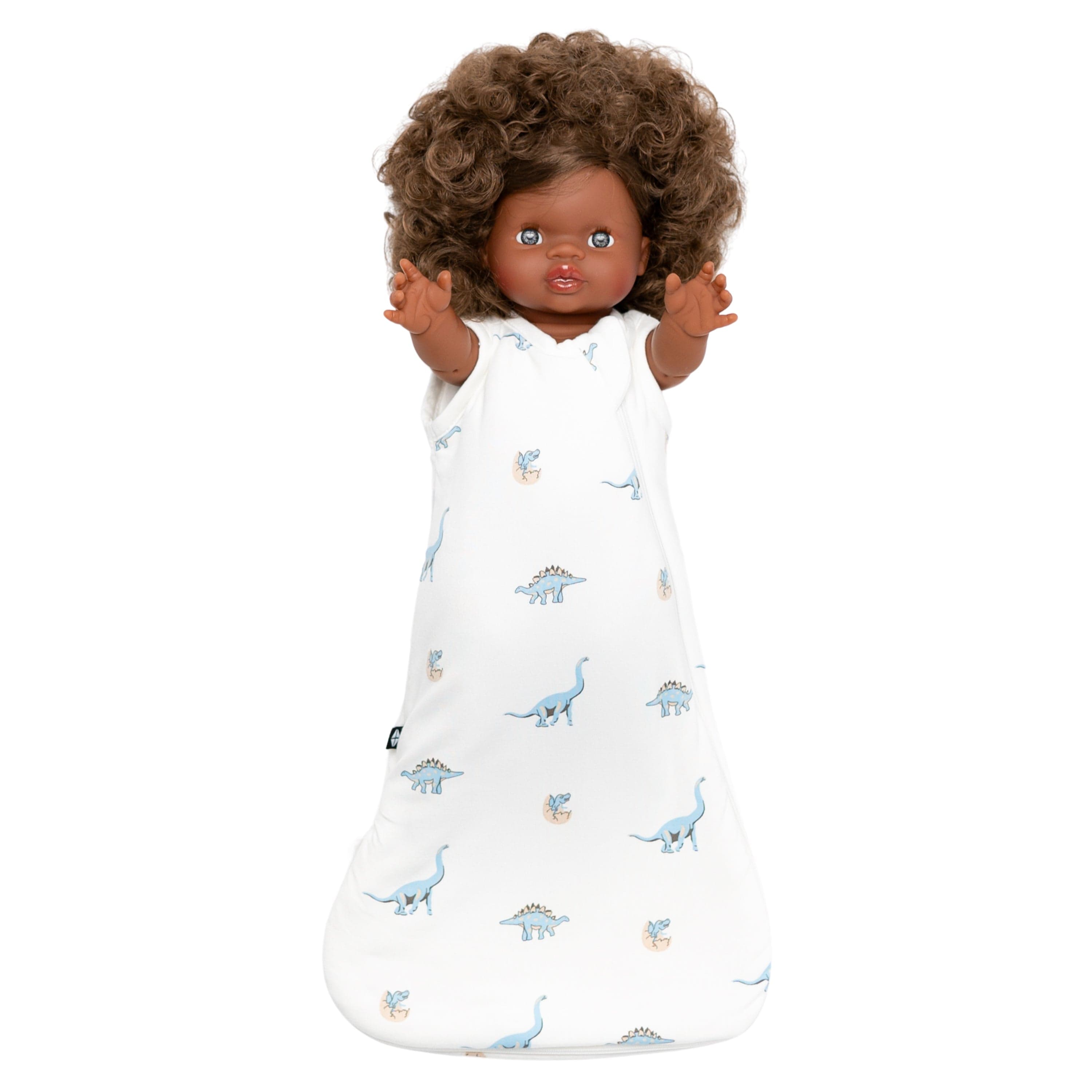 Toy wearing Kyte Baby Dolly Sleep Bag in Jurassic