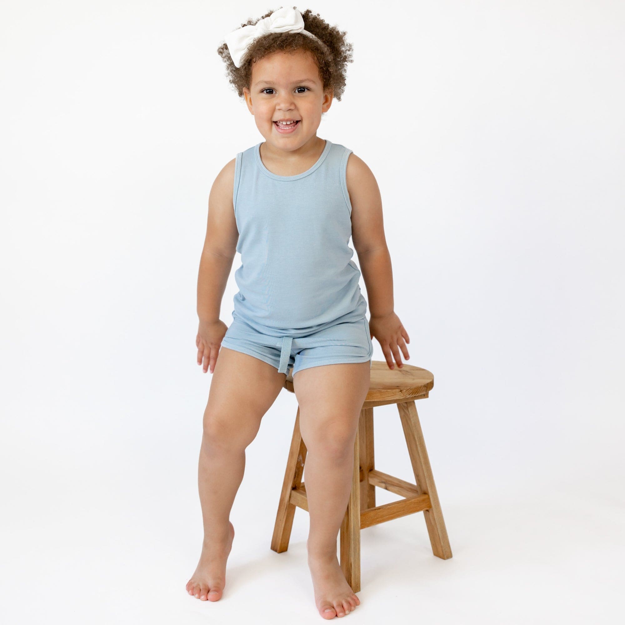 Toddler wearing Kyte Baby Bamboo Jersey Tank Jogger Set in Fog