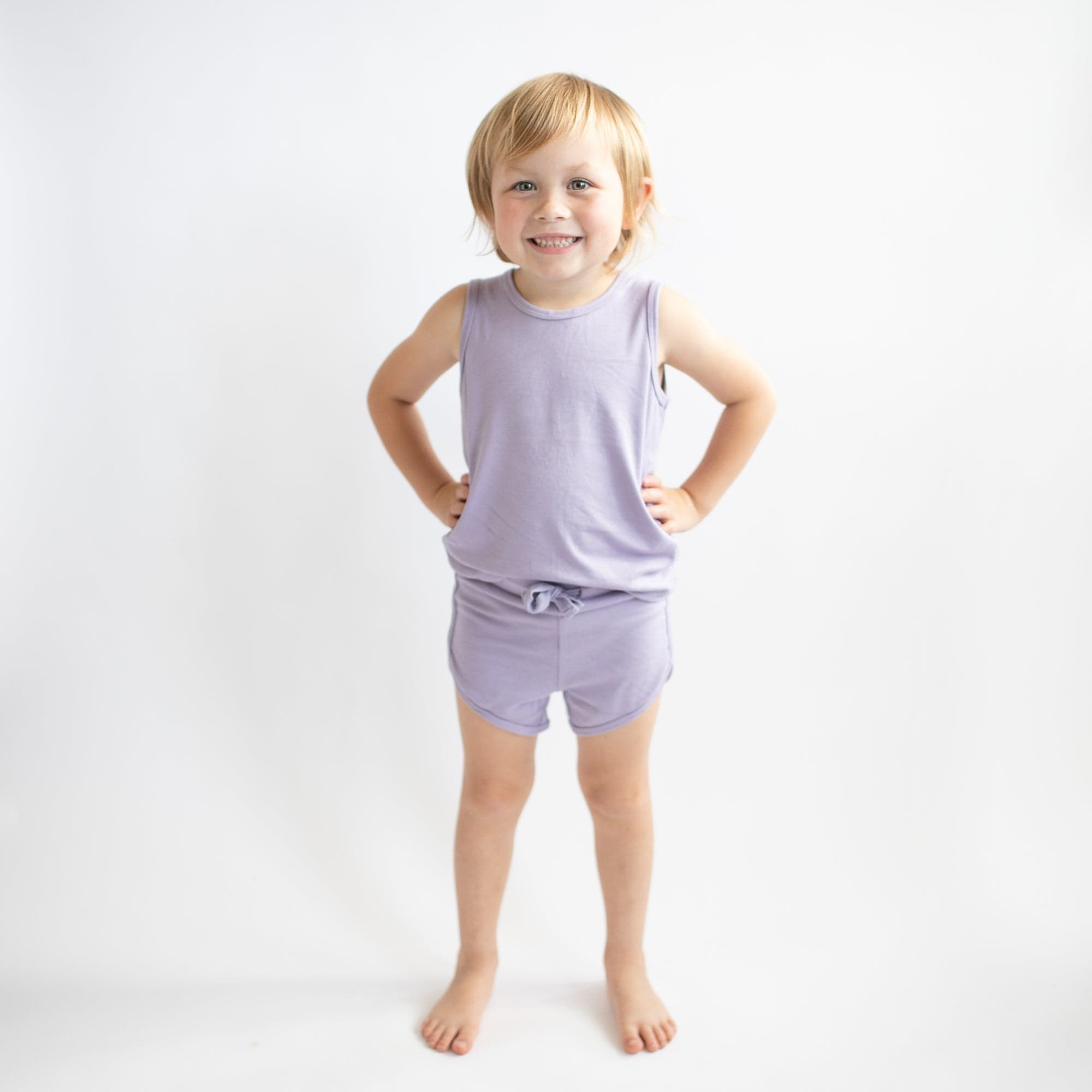 Toddler wearing Kyte Baby Bamboo Jersey Tank Jogger Set in Taro