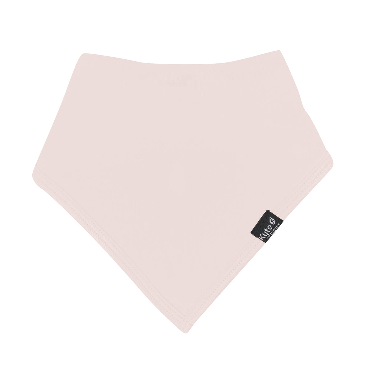 Flat lay of Kyte Baby Bib in Blush
