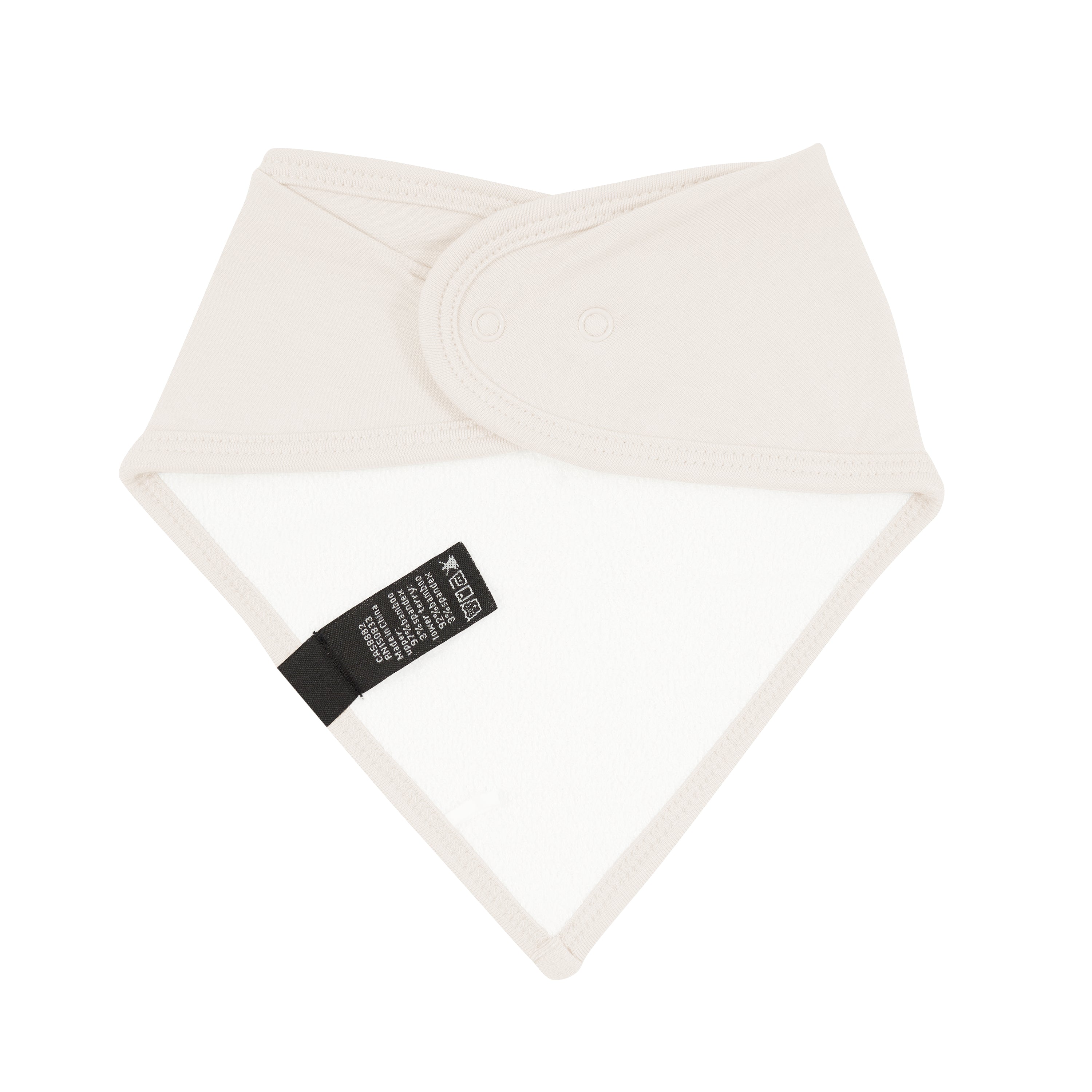 Bamboo terry lining on Kyte Baby Bib in Oat