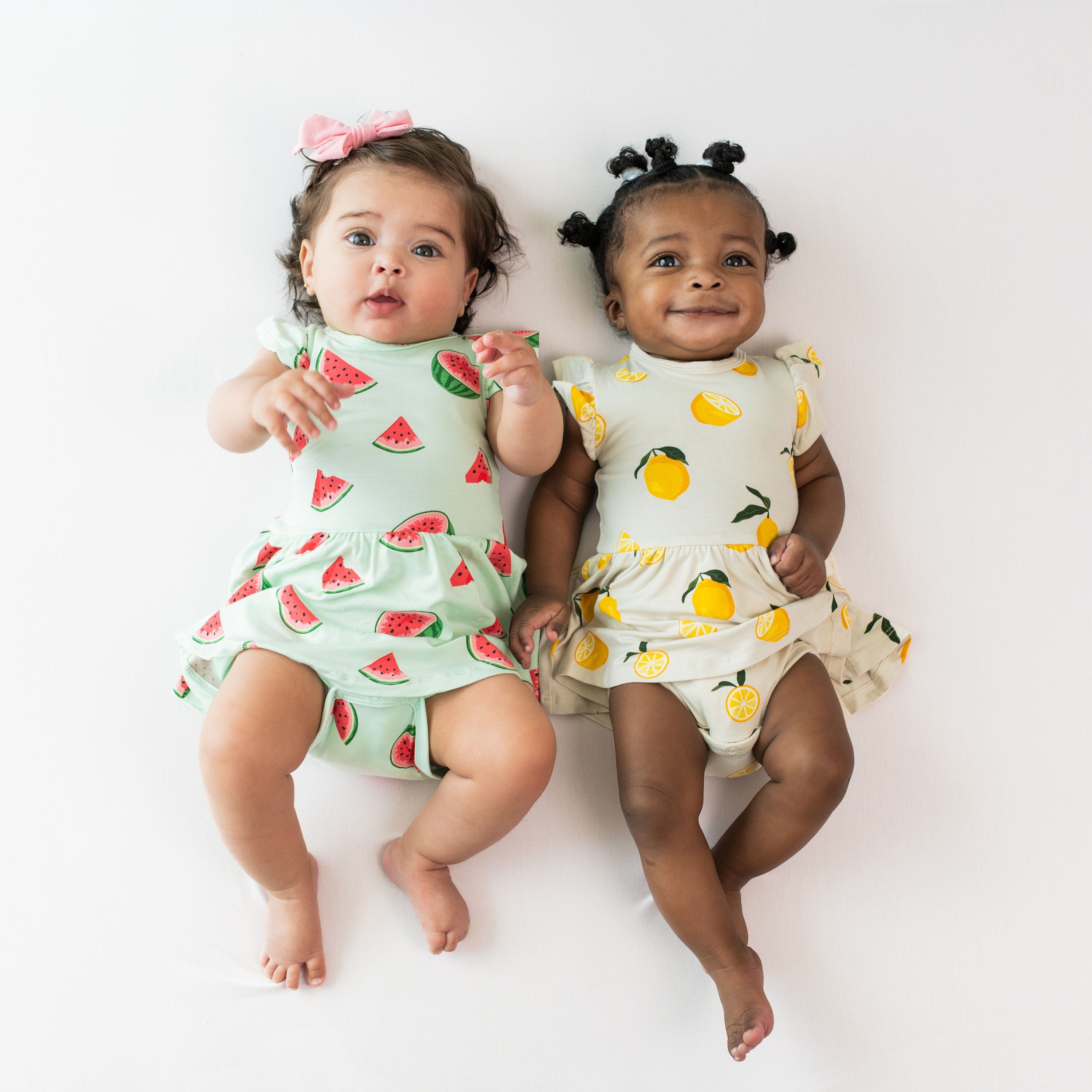 Babies wearing Twirl Bodysuit Dress in Lemon and Watermelon