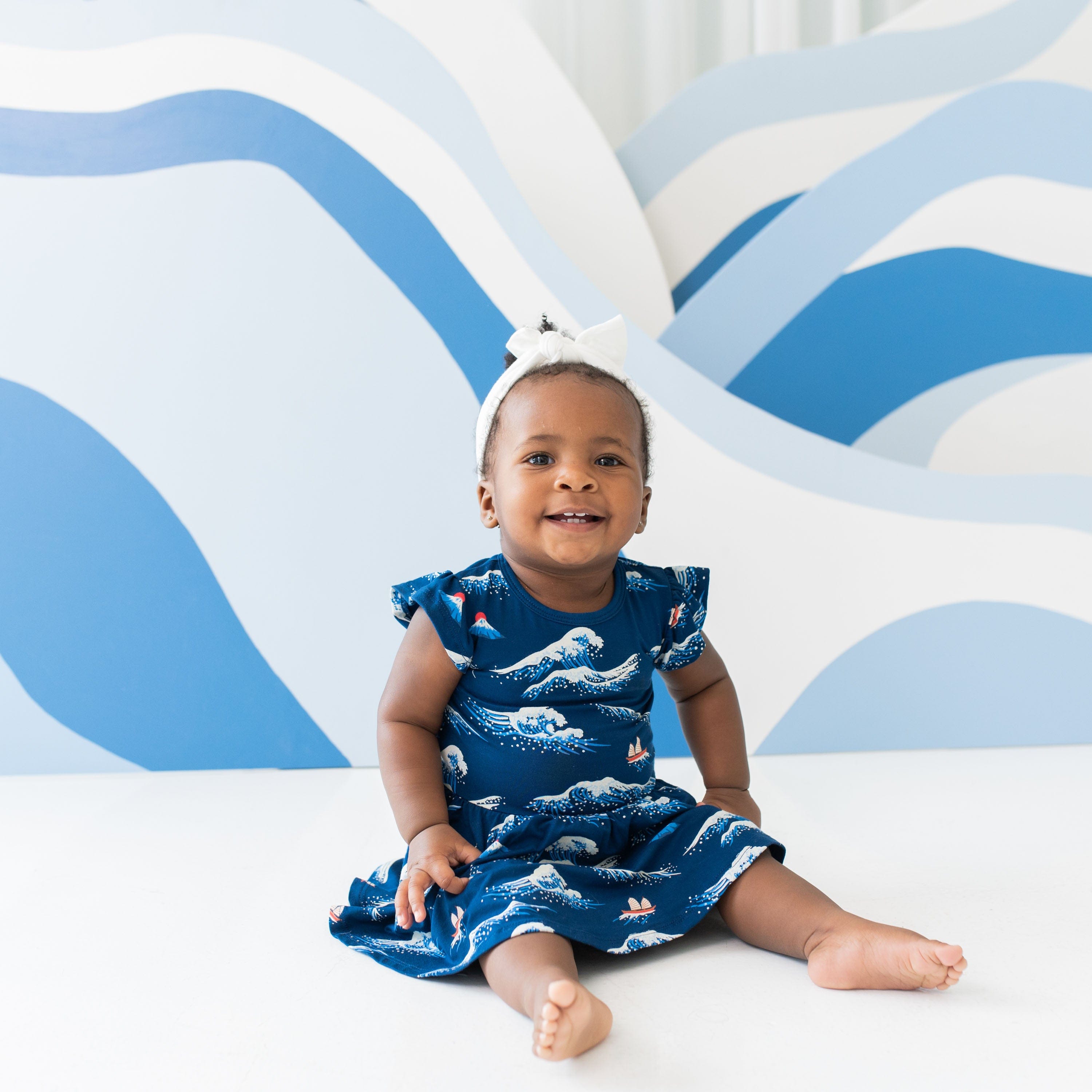 Kyte Baby Bodysuit Dress Twirl Bodysuit Dress in Wave