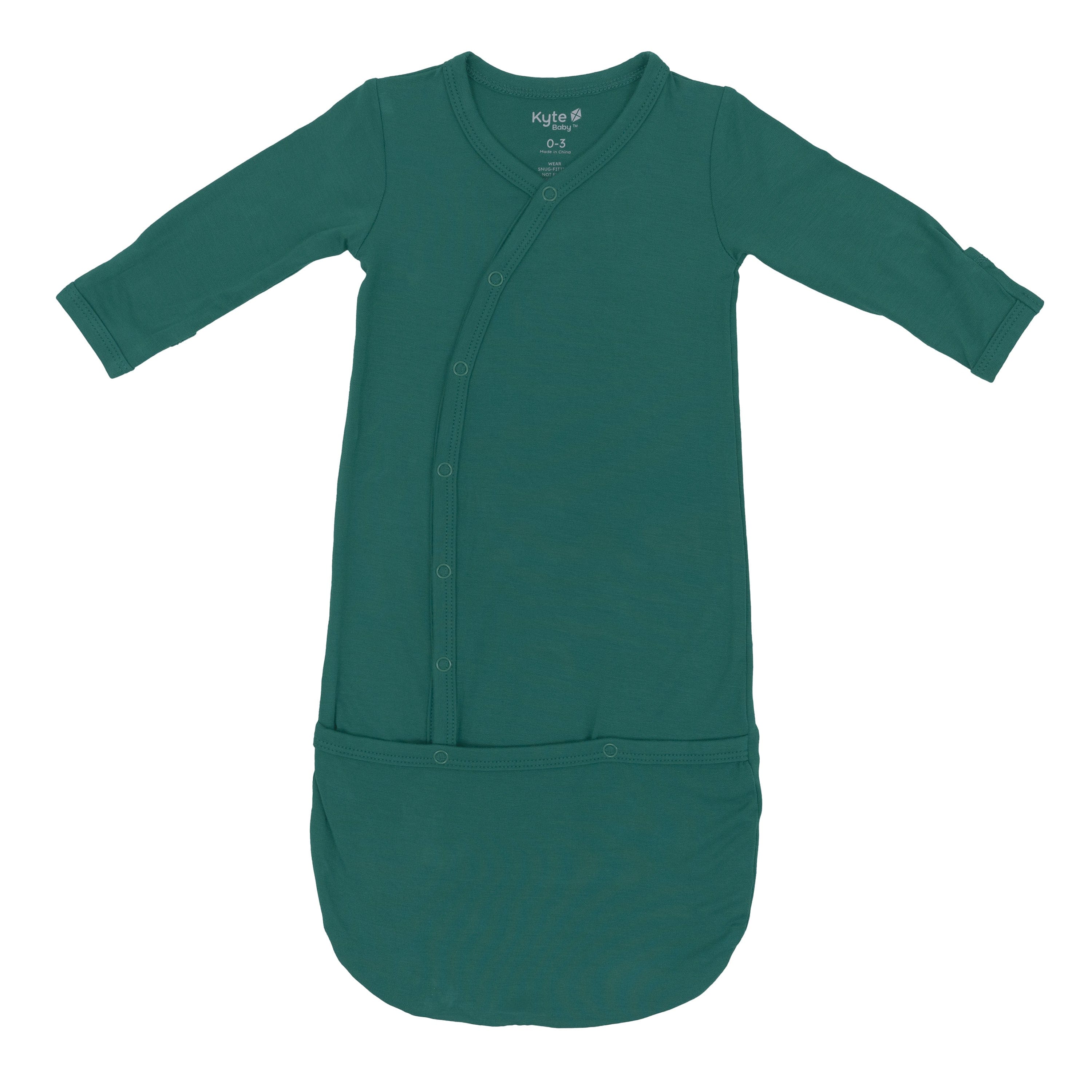 Flay lay in Kyte Baby Bundler in Emerald