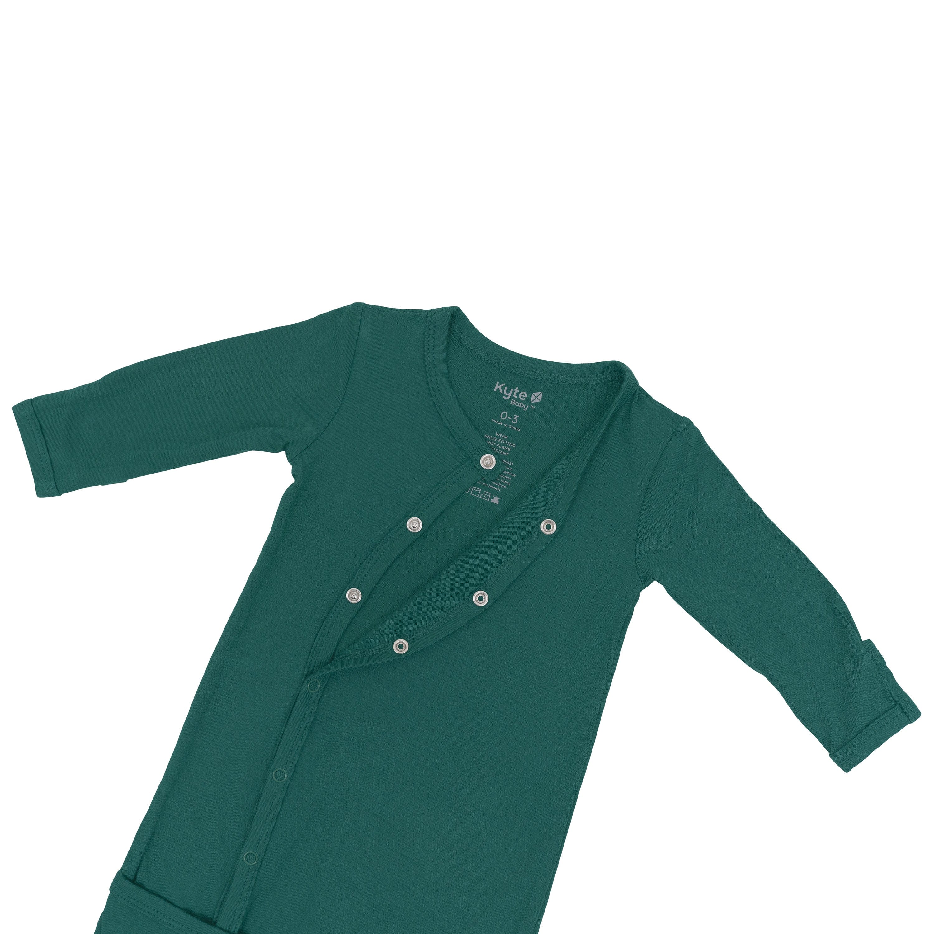 Snap closure partially unsnapped on Kyte Baby Bundler in Emerald