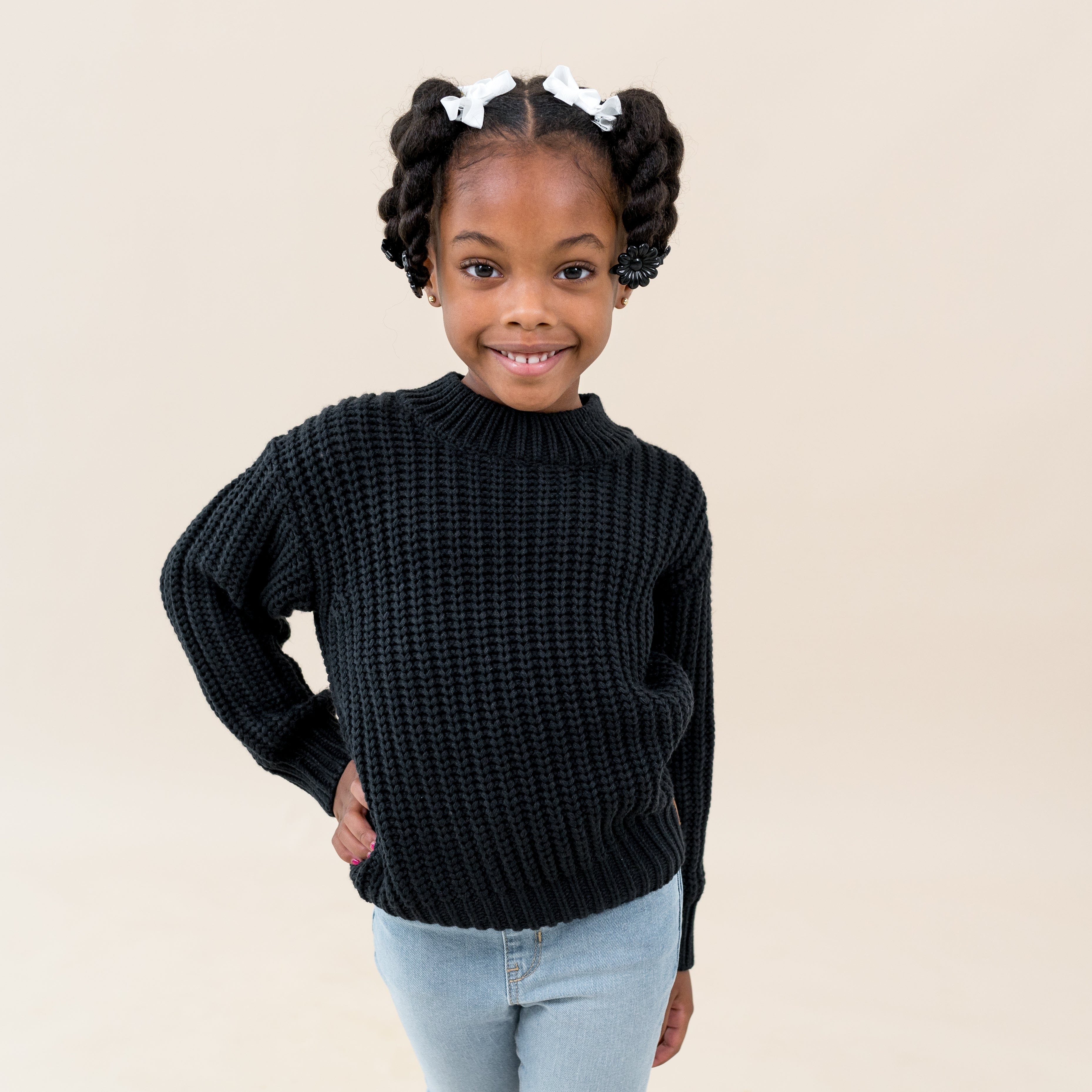 Child wearing Kyte Baby Chunky Knit Sweater in Midnight