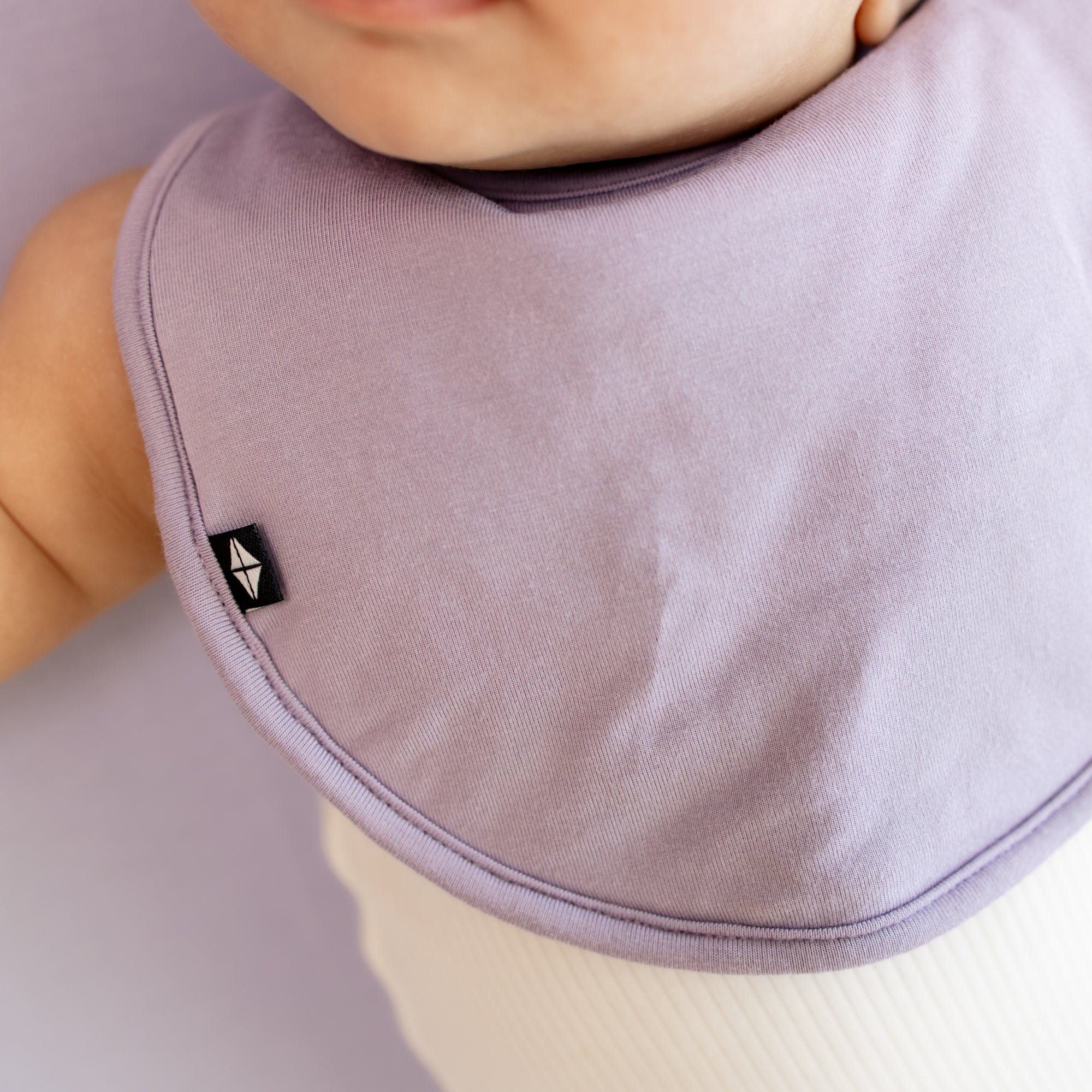 Kyte Baby Bamboo Cushy Bib in Taro purple