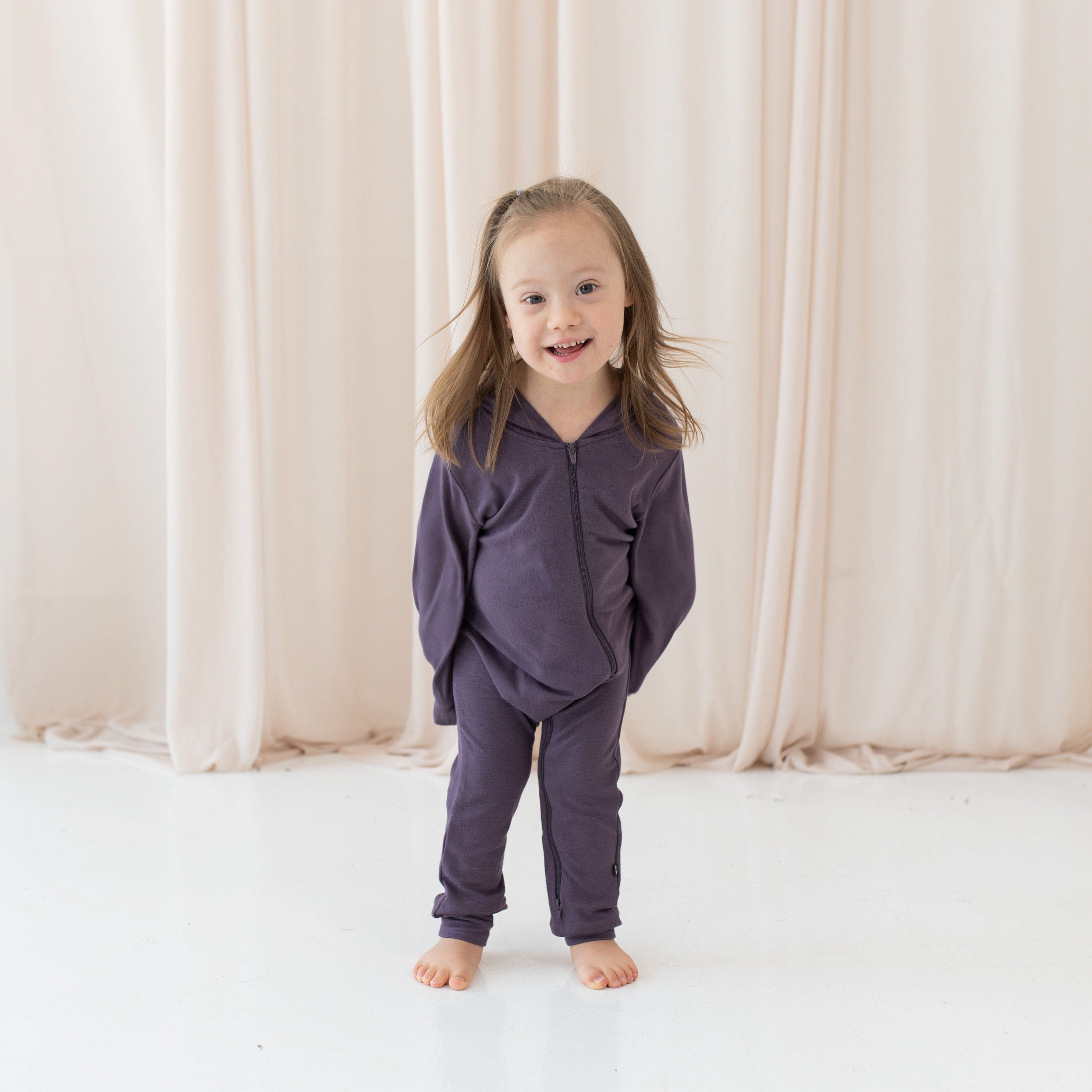 Toddler wearing Bamboo Jersey Zippered Romper with Hood in Currant