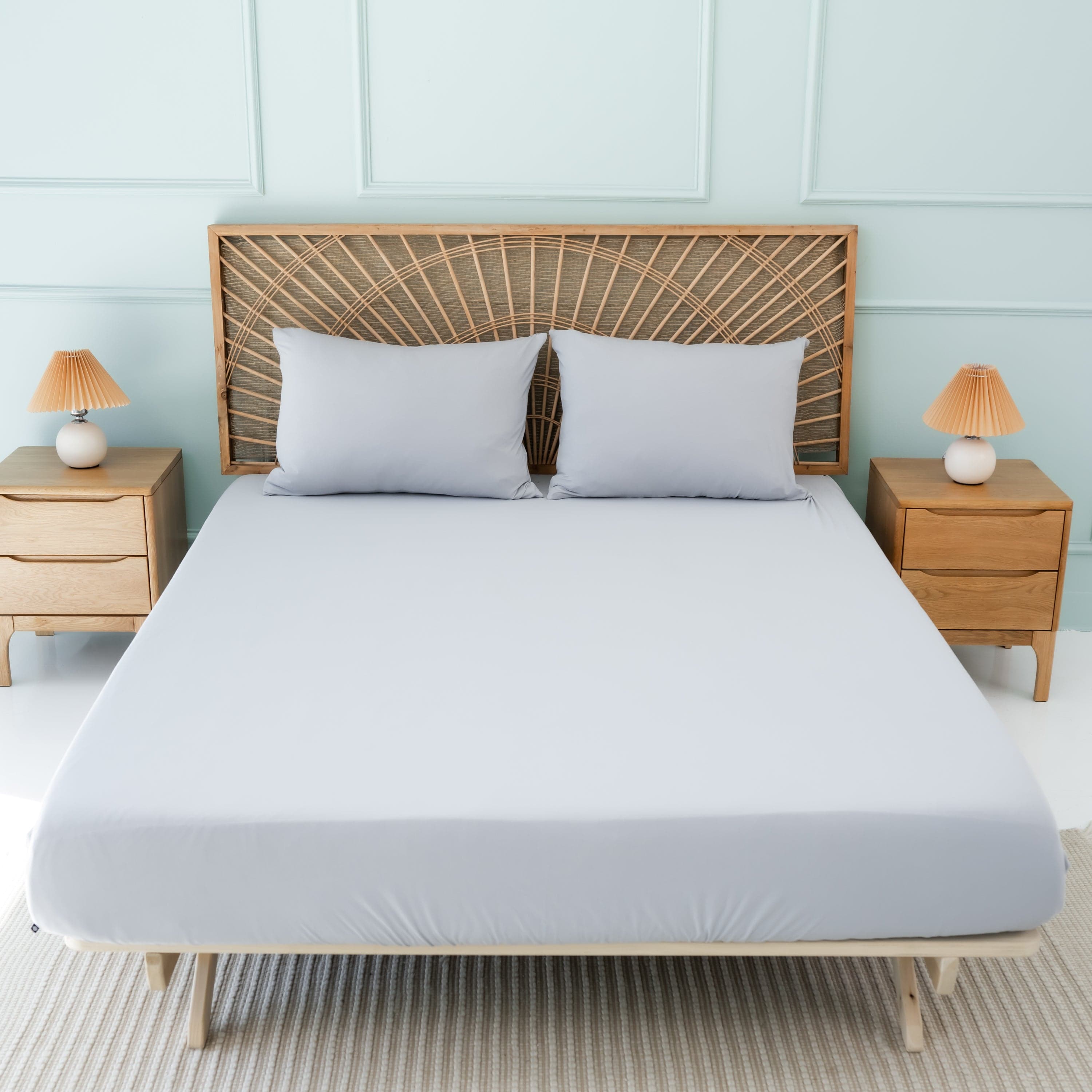 Bed Made with Kyte Baby Fitted Sheet with Pillowcases in Storm