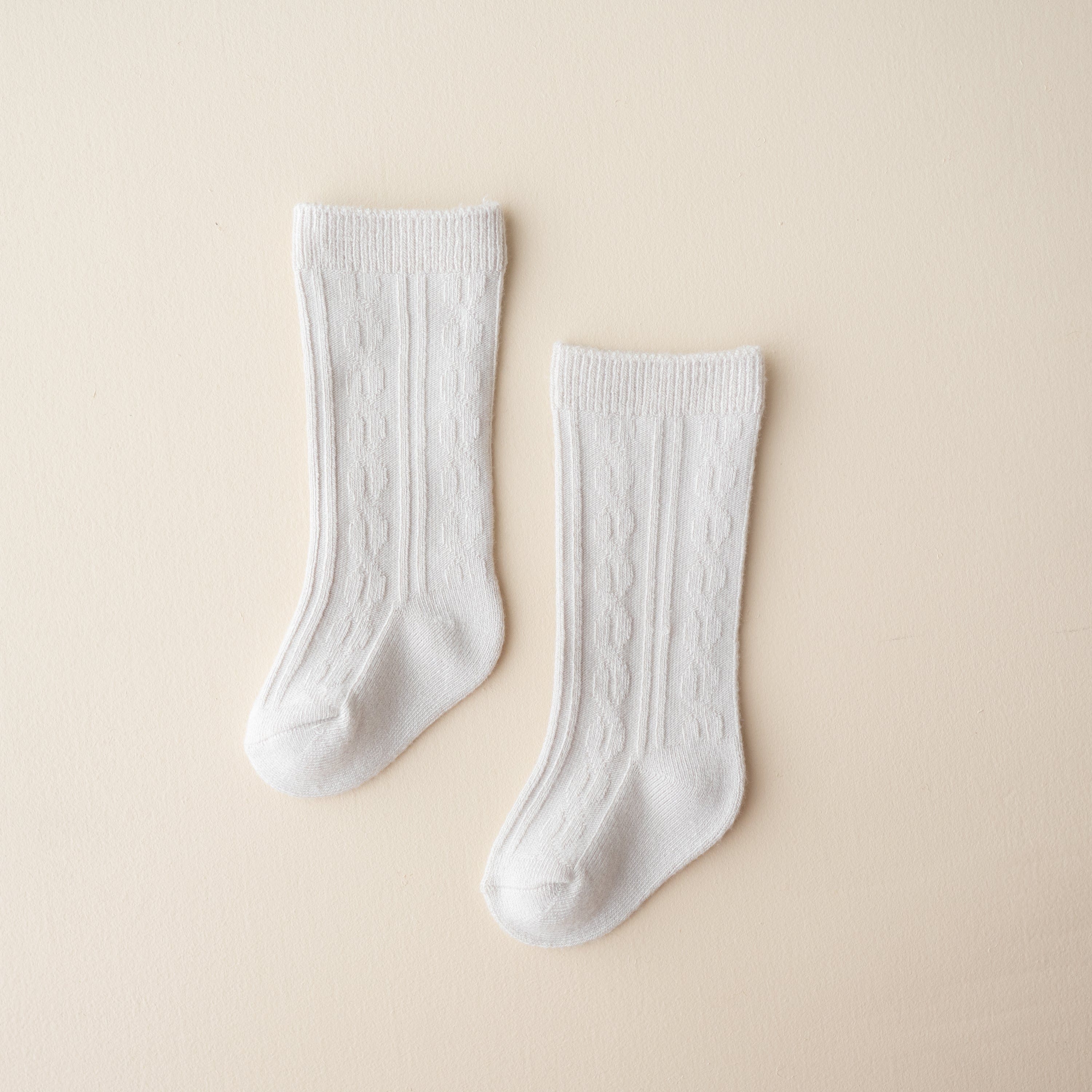 Kyte Baby bamboo cable knit Knee High Socks in Oat