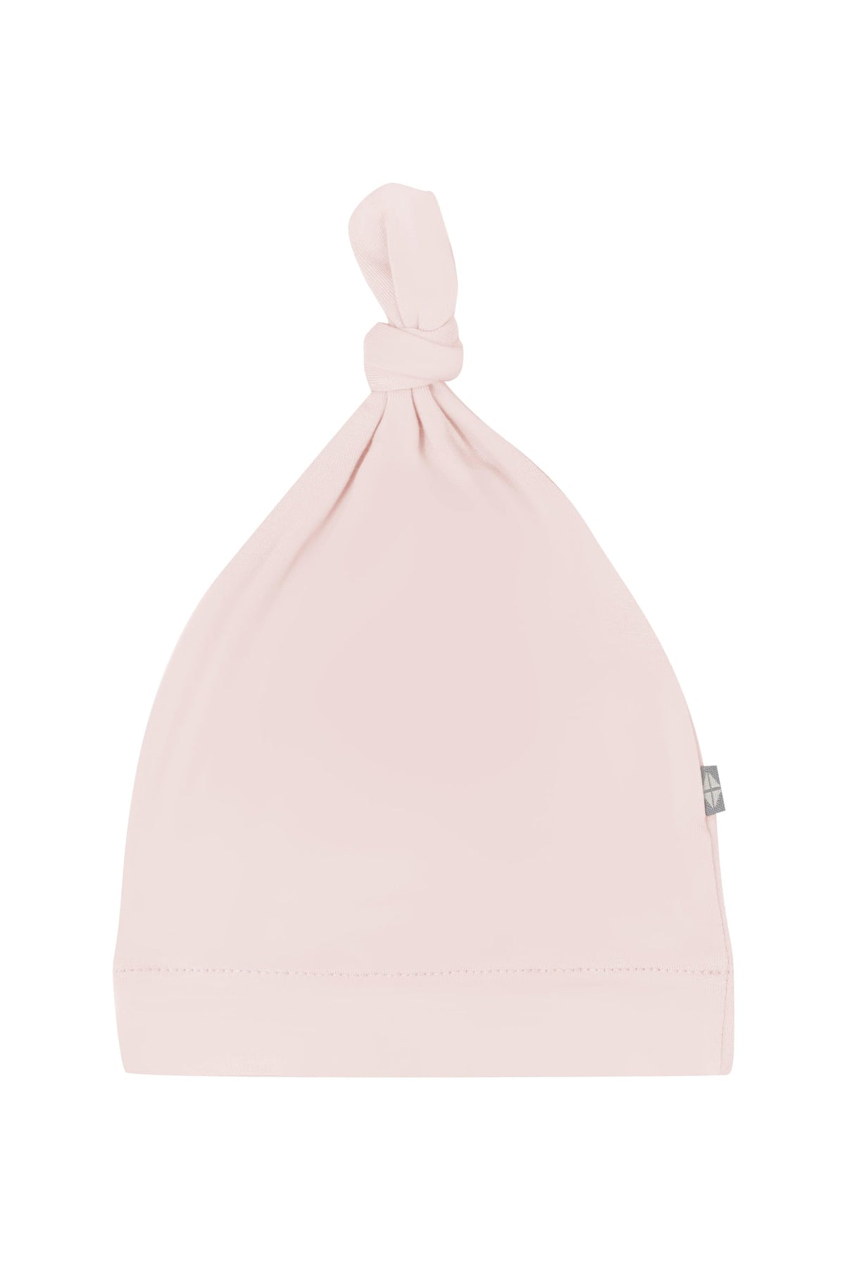 Flat lay of Kyte Baby Knotted Cap in Blush