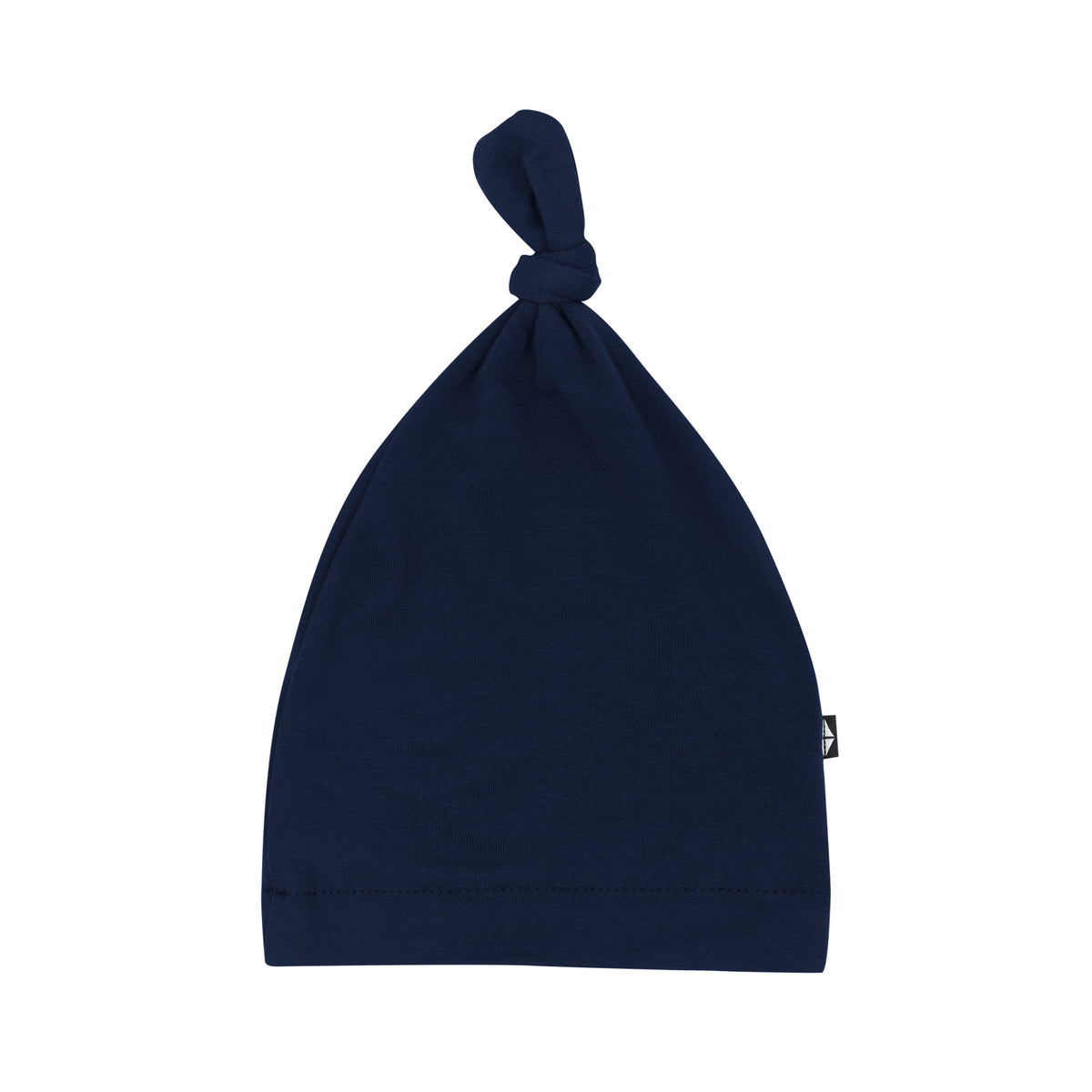 Flat lay of Kyte Baby Knotted Cap in Navy