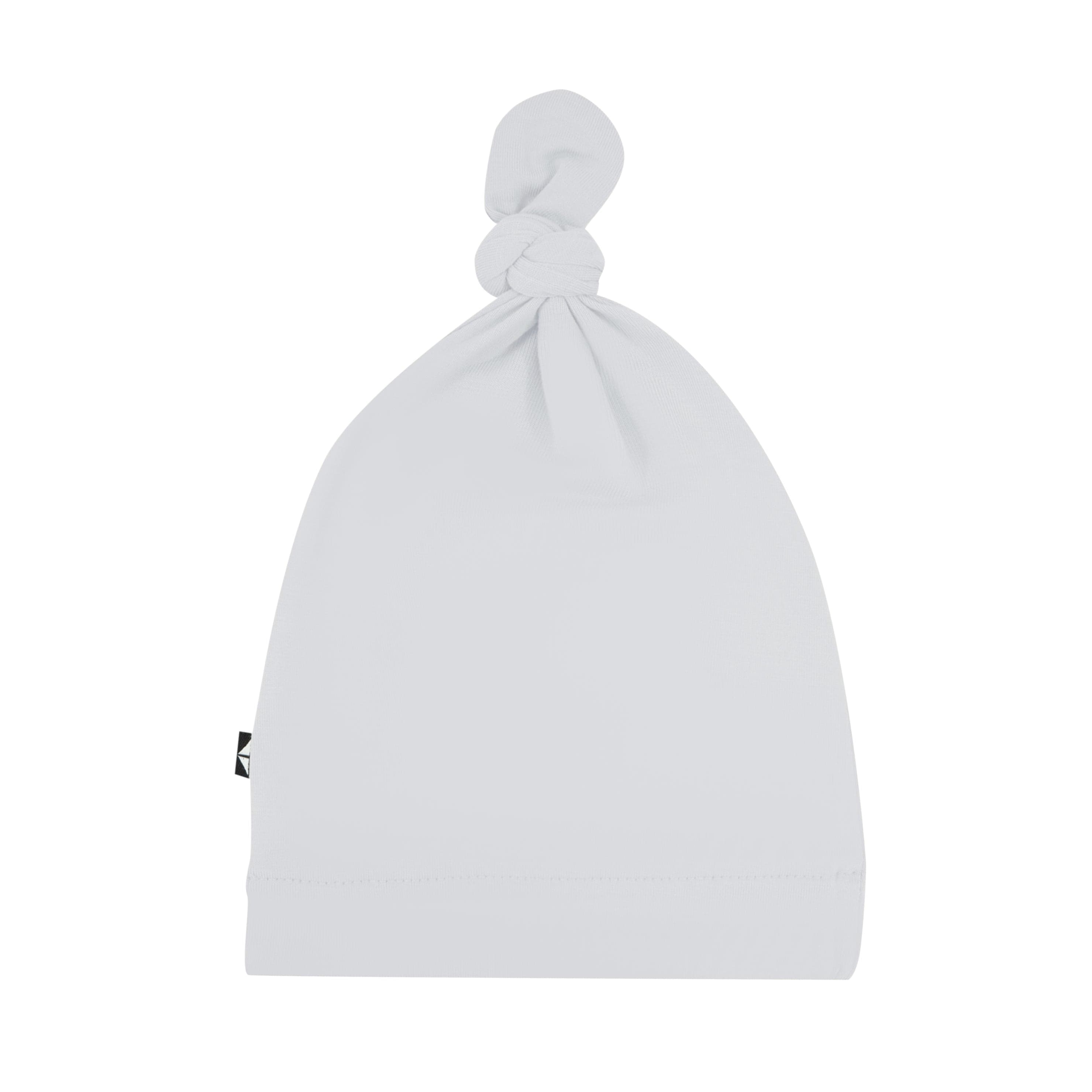 Flat lay of Kyte Baby Knotted Cap in Storm