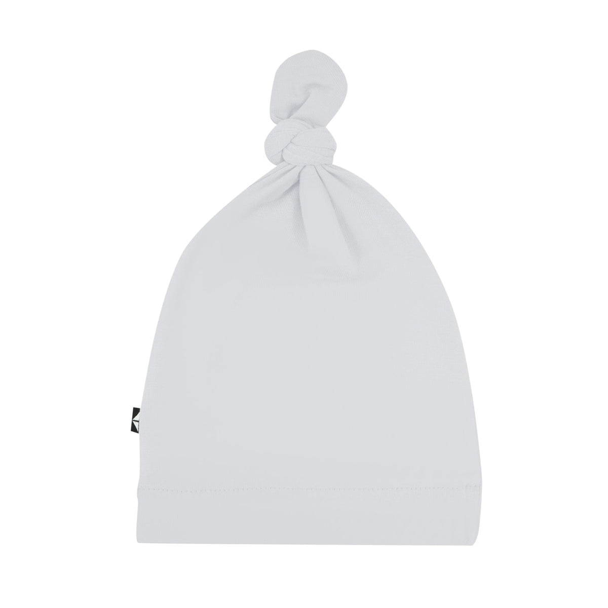 Flat lay of Kyte Baby Knotted Cap in Storm