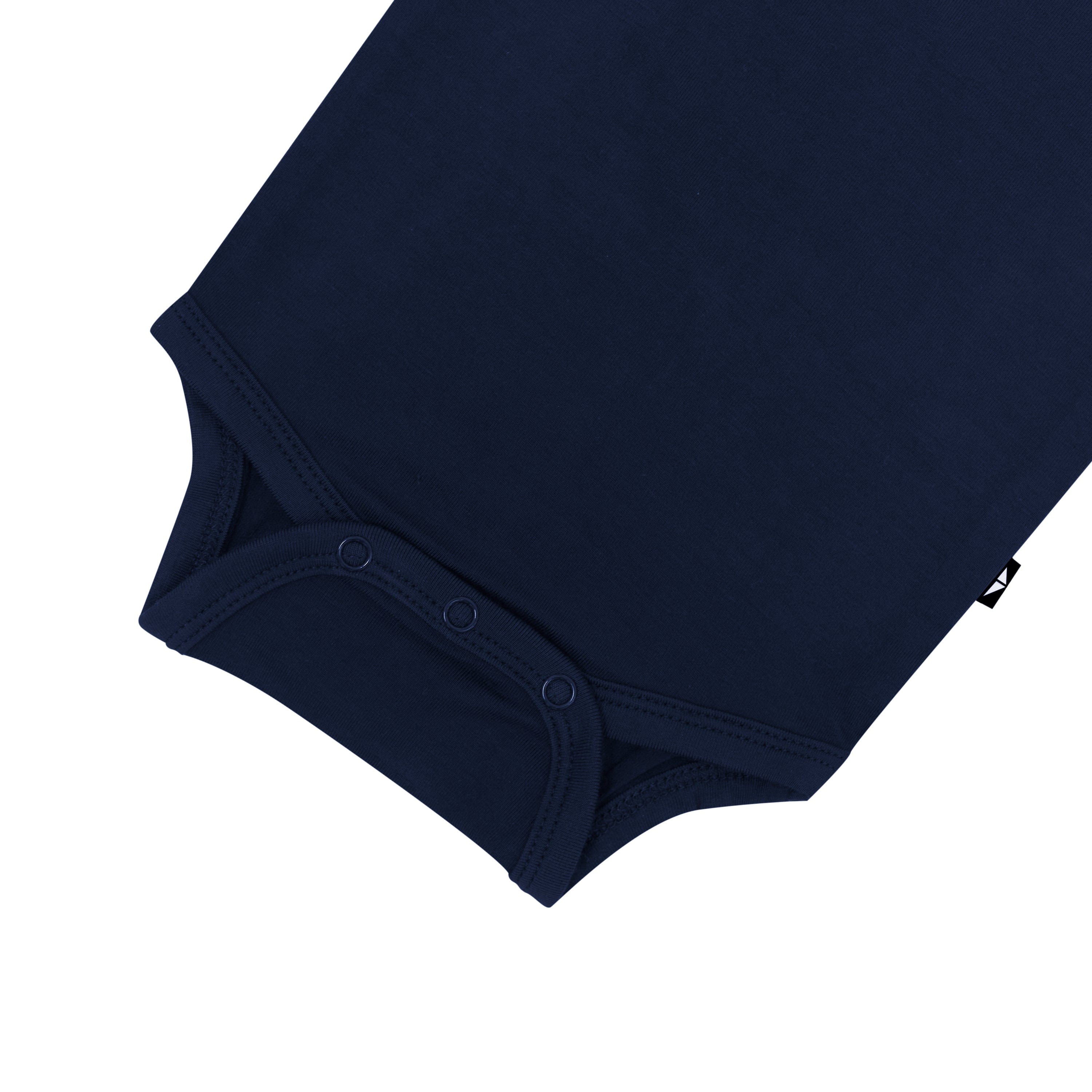 Bottoms snaps on Kyte Baby Long Sleeve Bodysuit in Navy