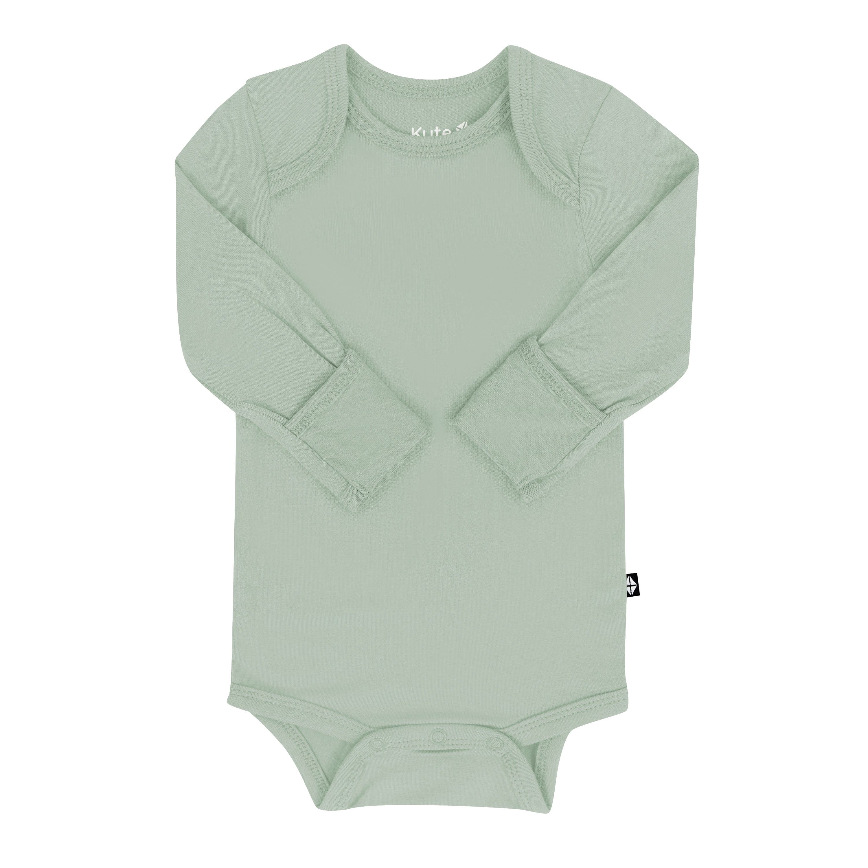 Snap bottom and fold-over cuffs of Kyte Baby Long Sleeve Bodysuit in Thyme green