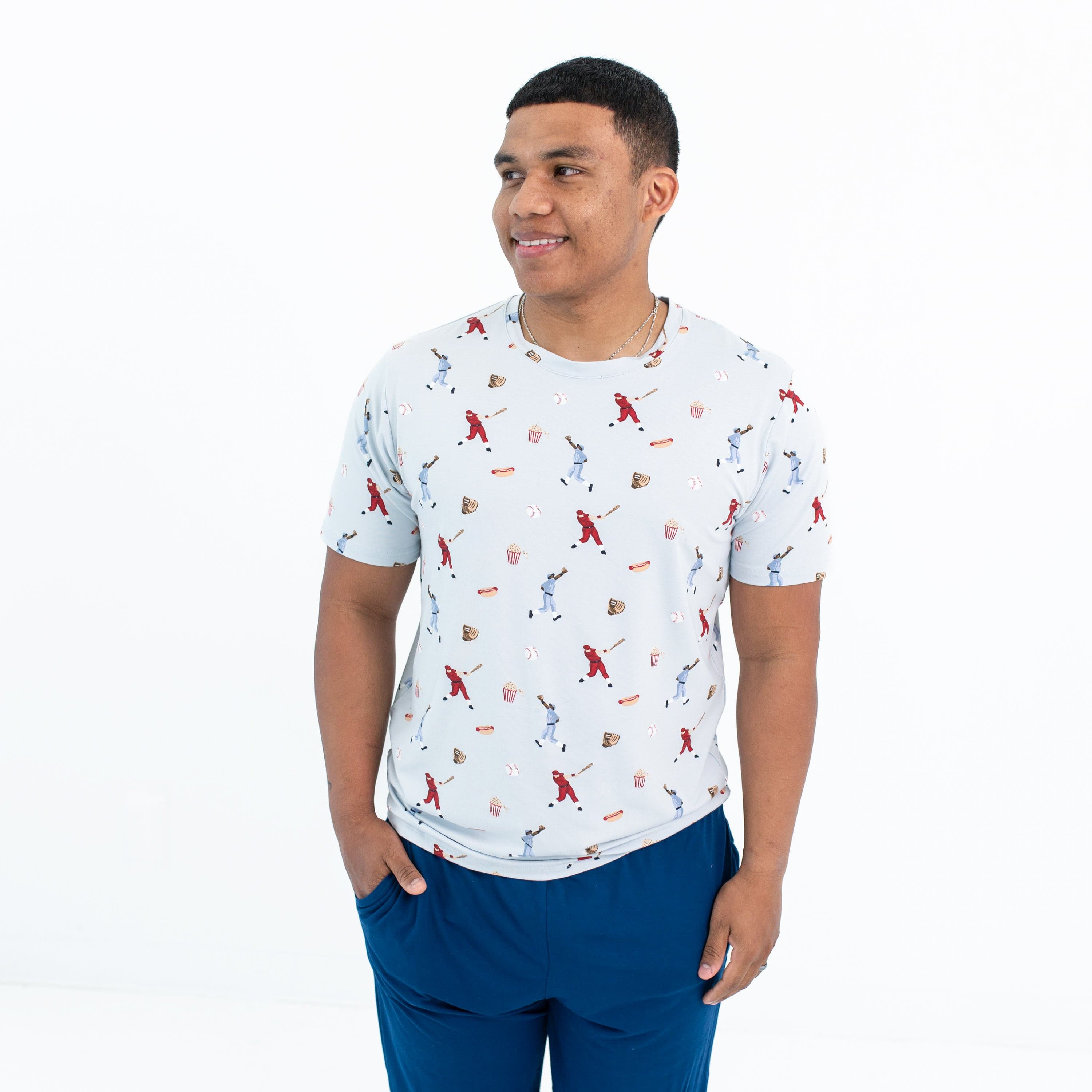 Man wearing Kyte Baby Men's Crew Neck Tee in Vintage Baseball