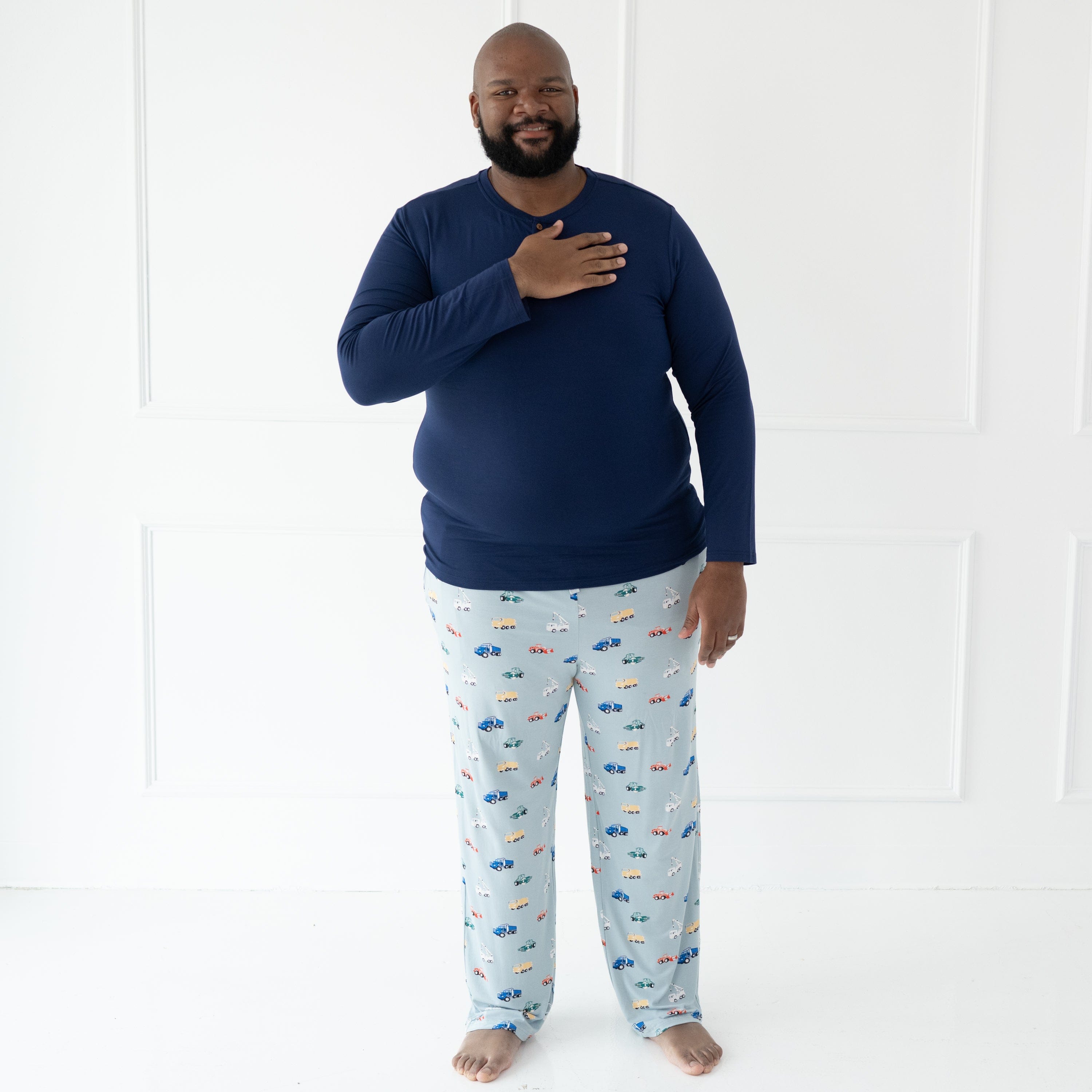Man wearing Kyte Baby bamboo Men's Lounge Pants in Construction