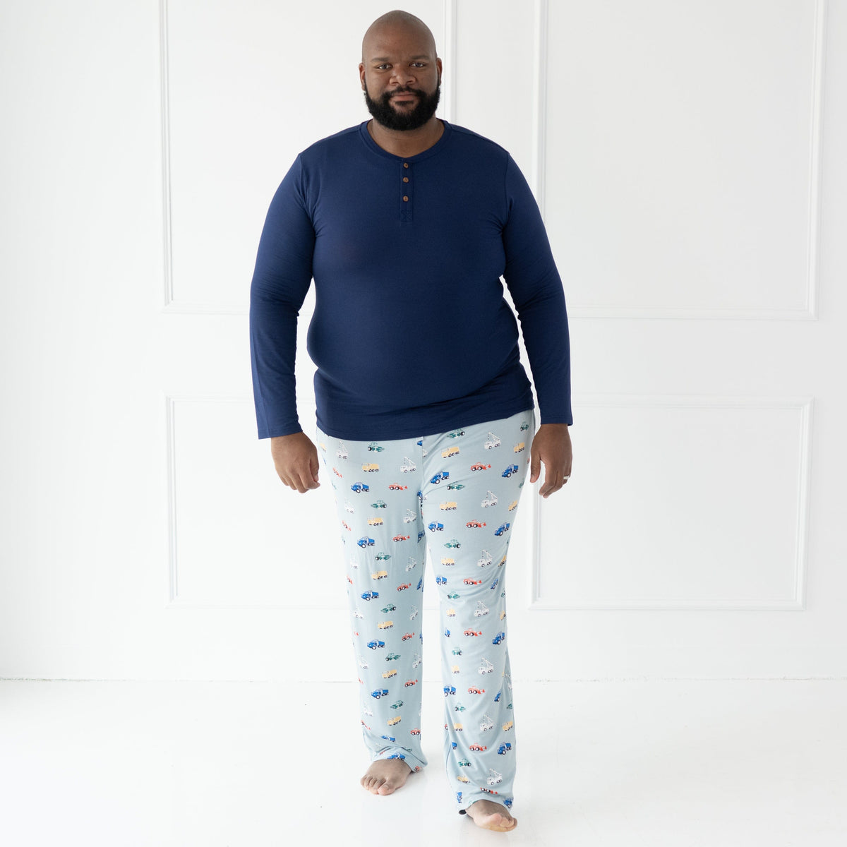 Man wearing Kyte Baby Men's Lounge Pants in Construction