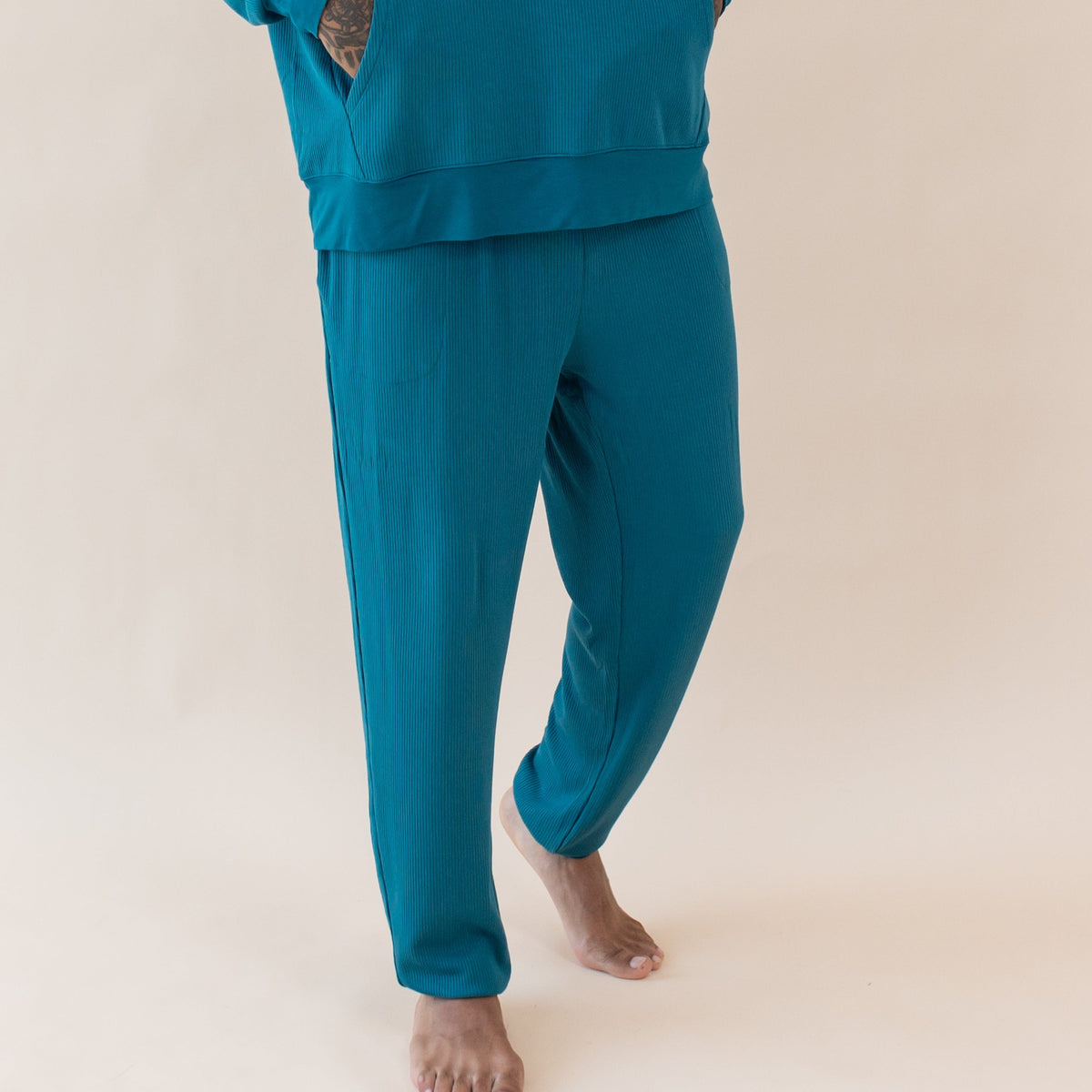 Man wearing Kyte Baby Men's Ribbed Jogger Pant in Loch