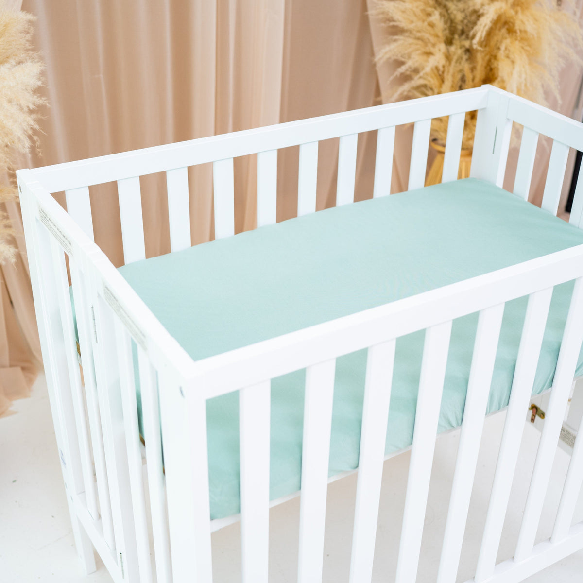Nursery with Kyte Baby bamboo Mini Crib Sheet in Sage Green