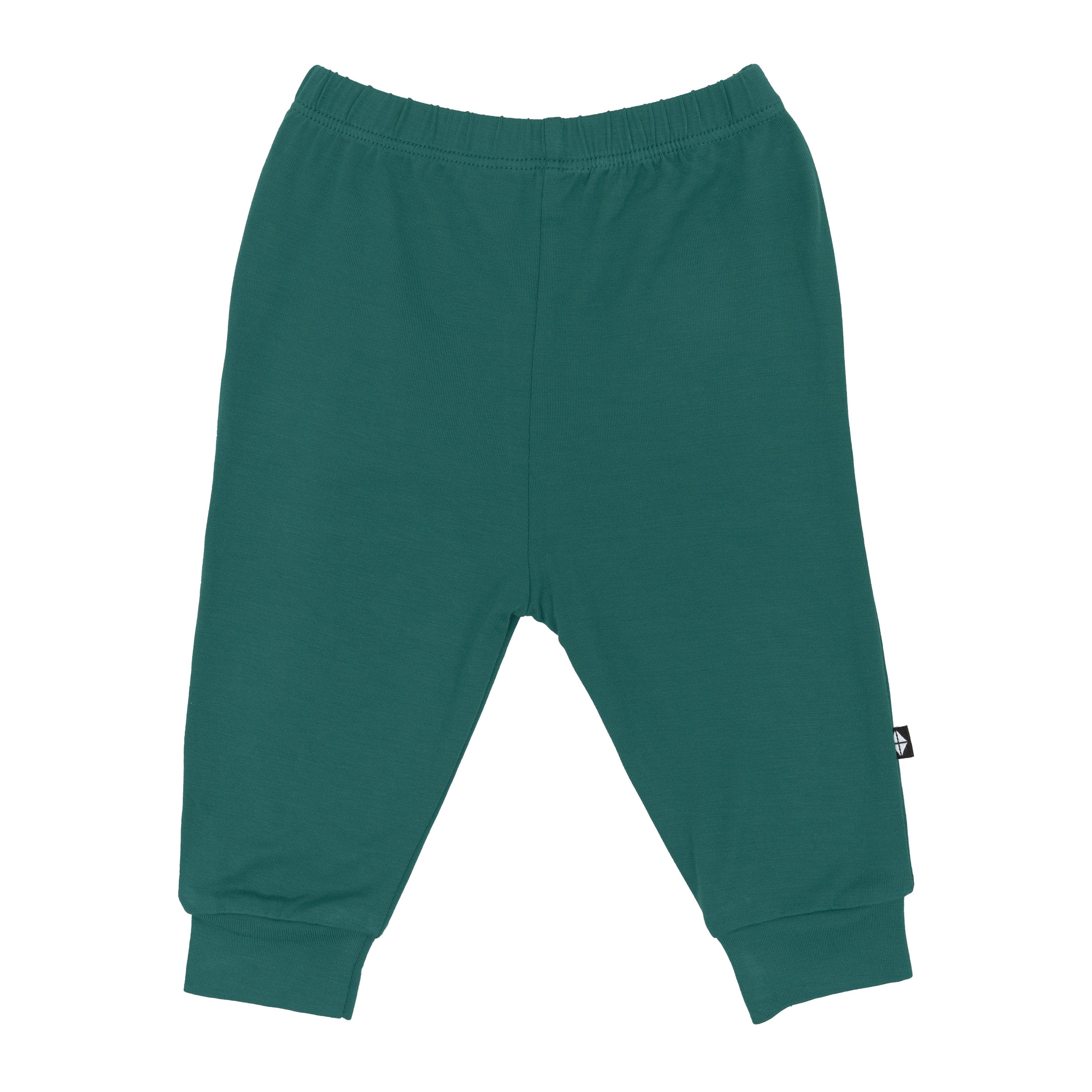 Flat lay of Kyte Baby Pants in Emerald