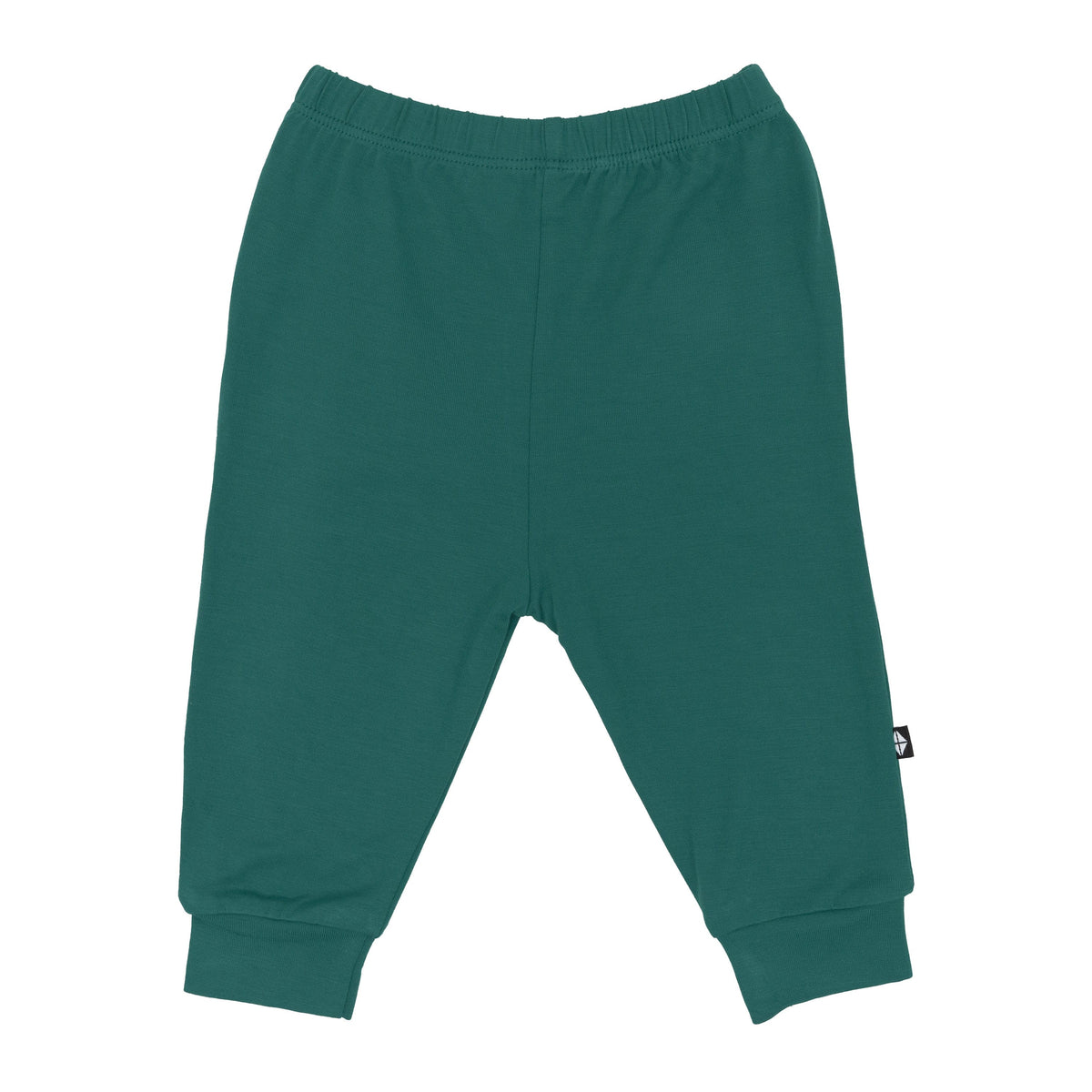 Flat lay of Kyte Baby Pants in Emerald
