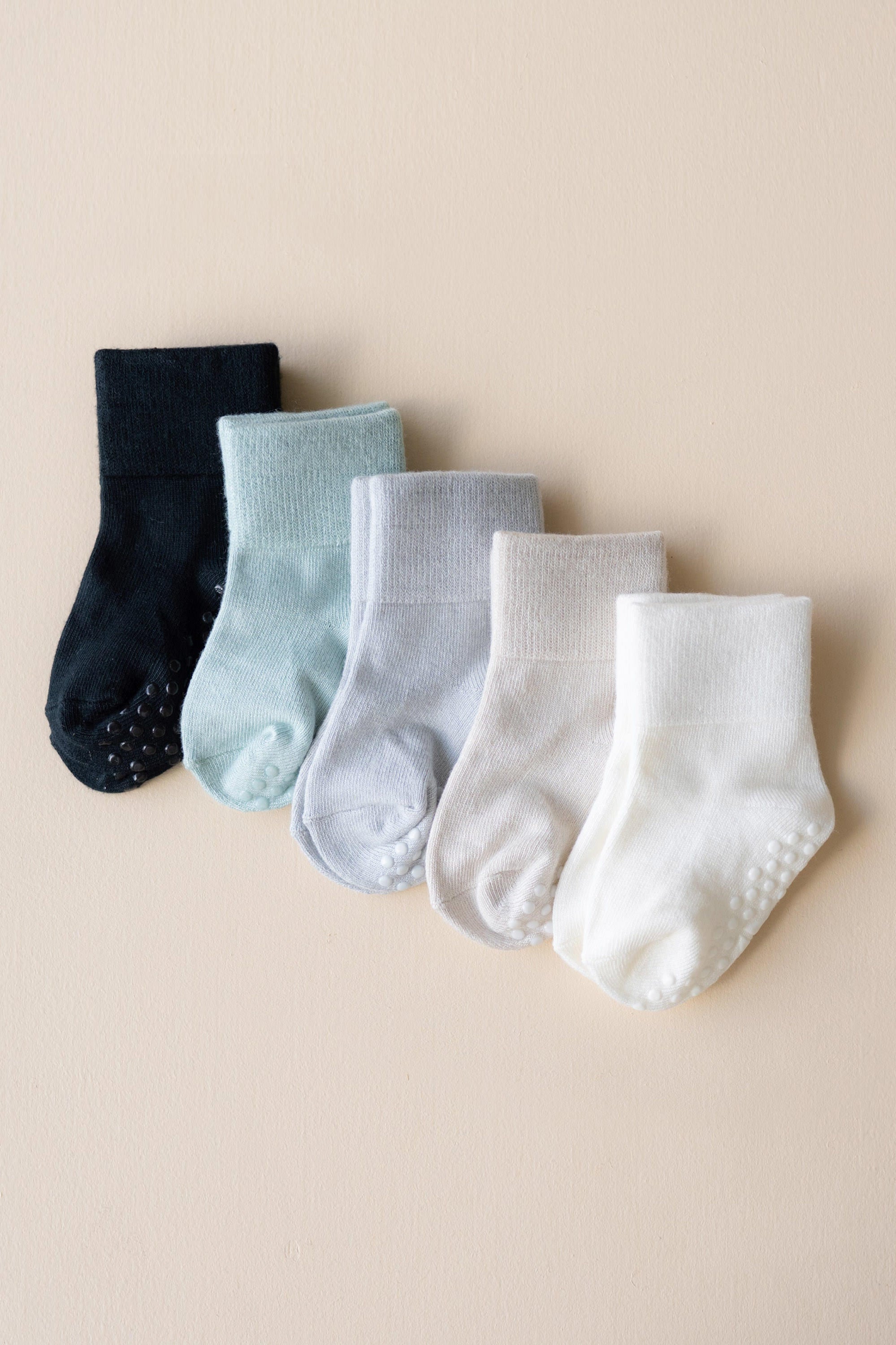 Five Pairs of Kyte Baby Quarter Length Socks with Grips in Neutral