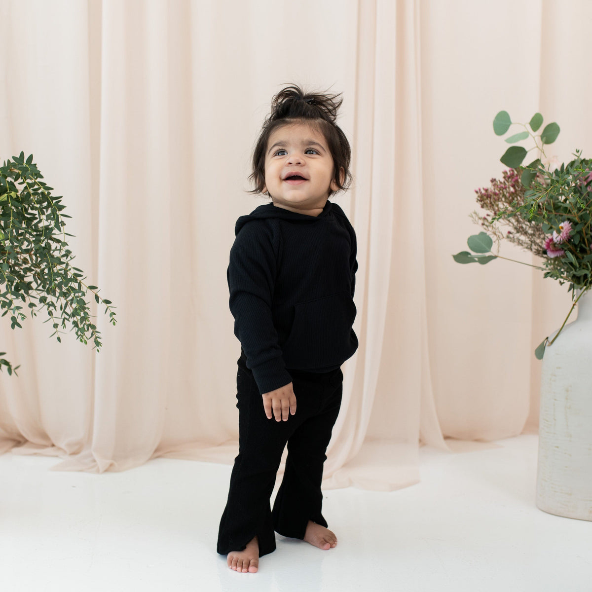 Toddler wearing Kyte Baby Ribbed Hoodie in Midnight