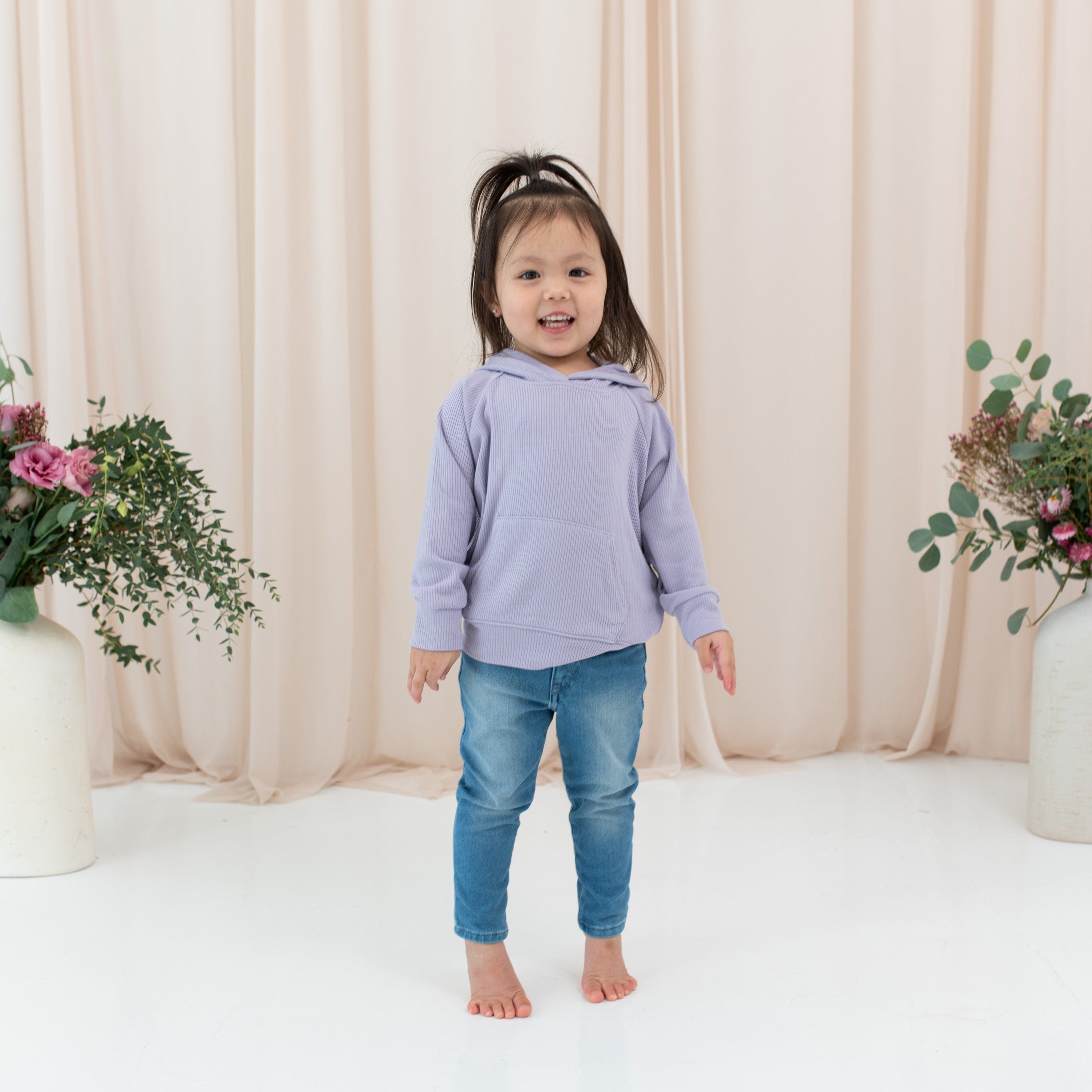 Toddler wearing Kyte Baby bamboo Ribbed Hoodie in Taro purple