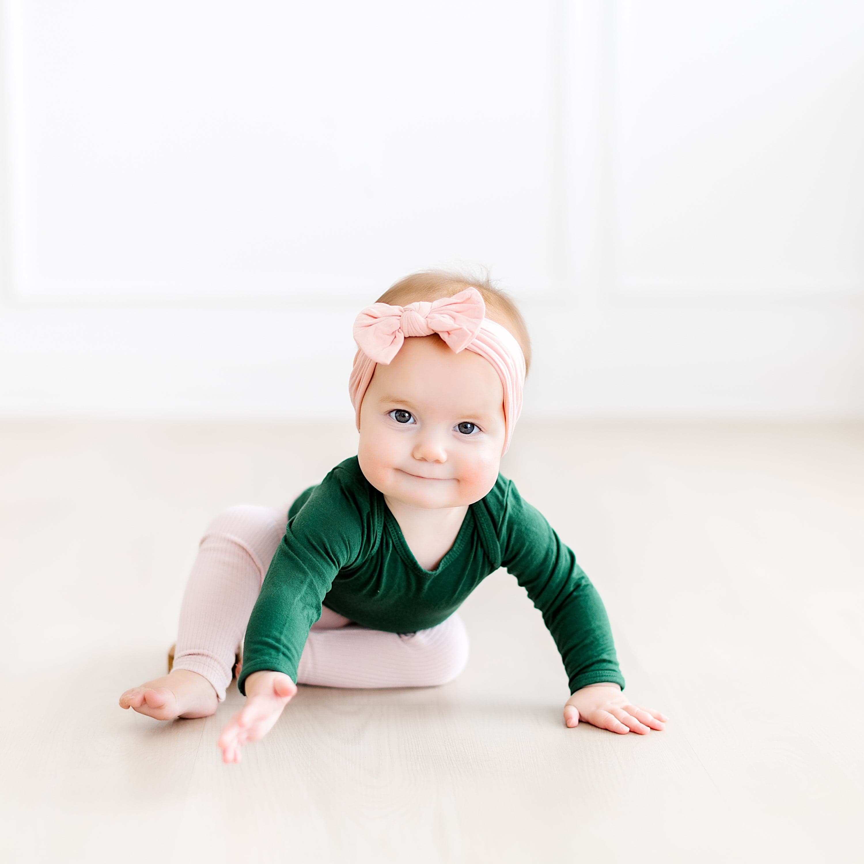 Infant Wearing Kyte Baby Ribbed Leggings in Blush