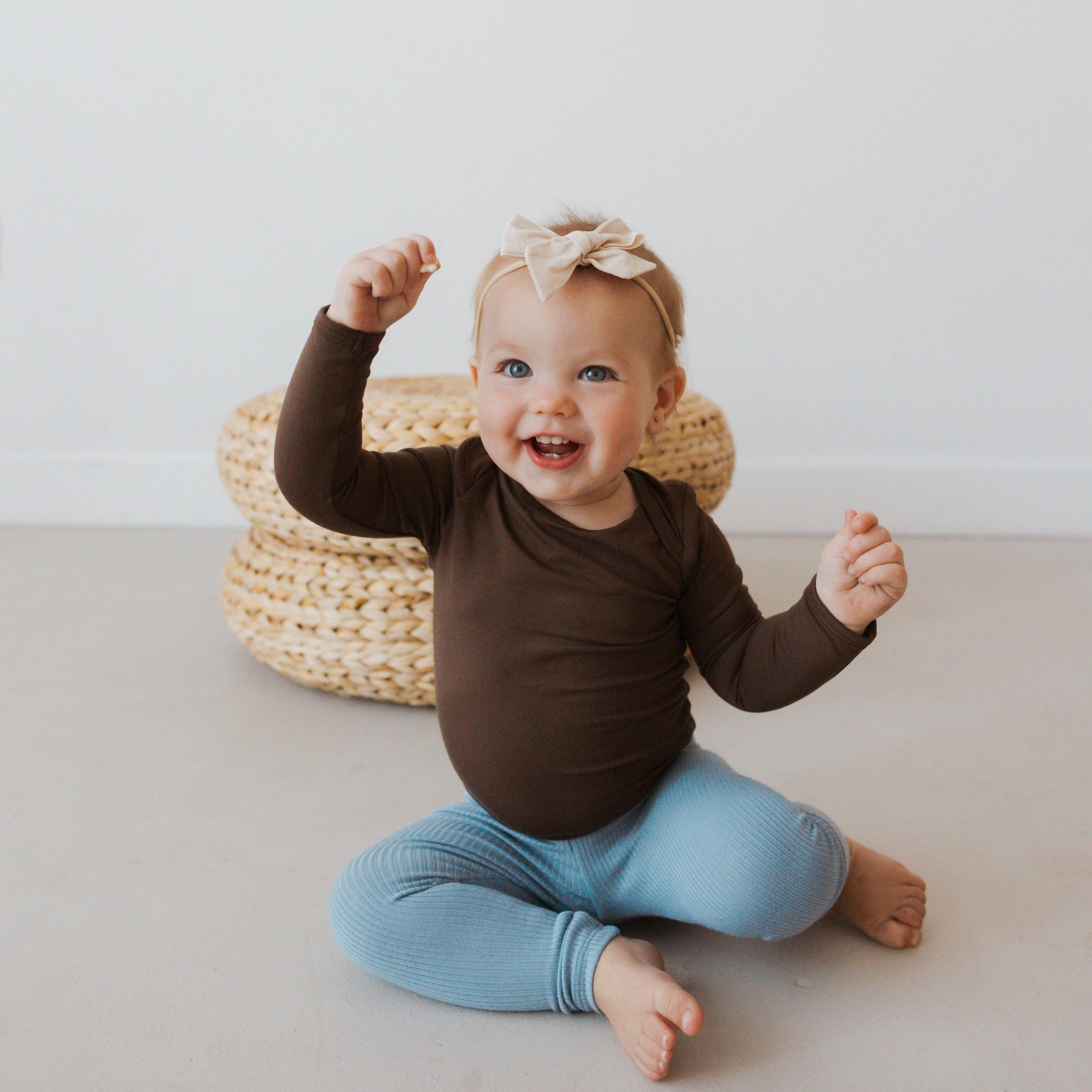 Infant Wearing Kyte Baby Ribbed Leggings in Slate